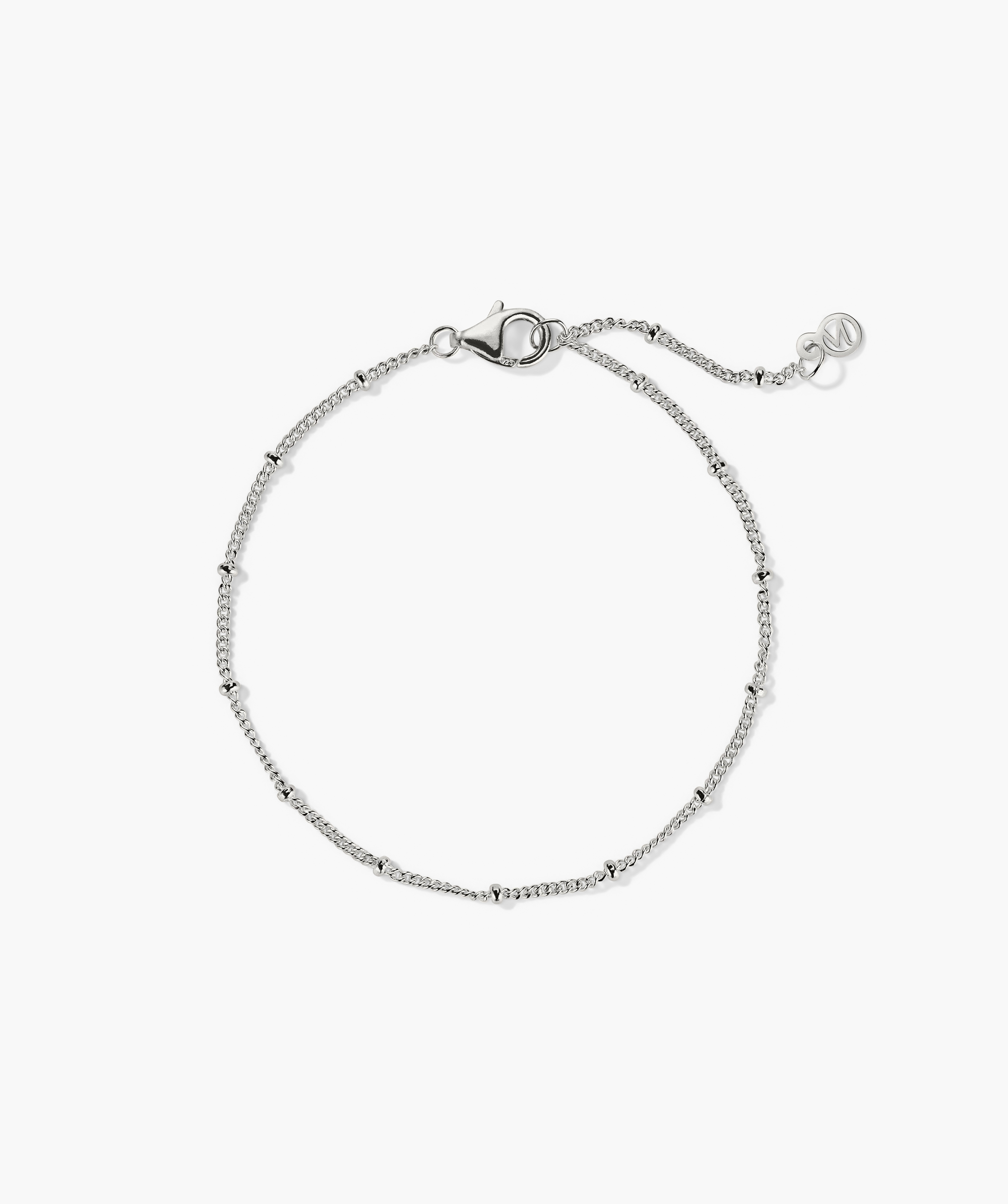 Spheres Chain Bracelet: A minimalistic silver chain bracelet with a clasp, perfect for any occasion, making a big statement with its simplicity.