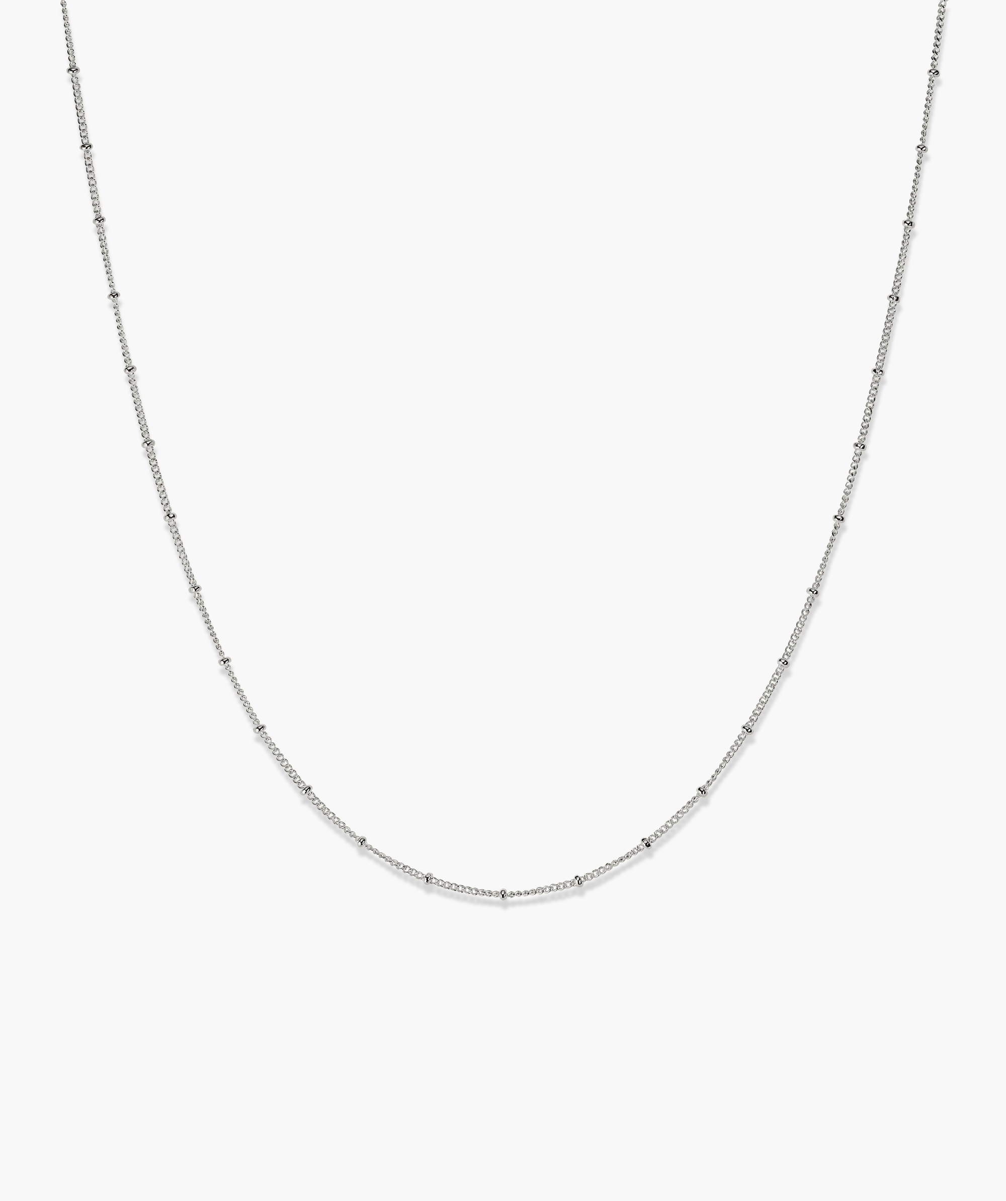Spheres Chain Necklace: A minimal yet impactful silver chain necklace featuring a delicate diamond pendant, suitable for versatile wear.
