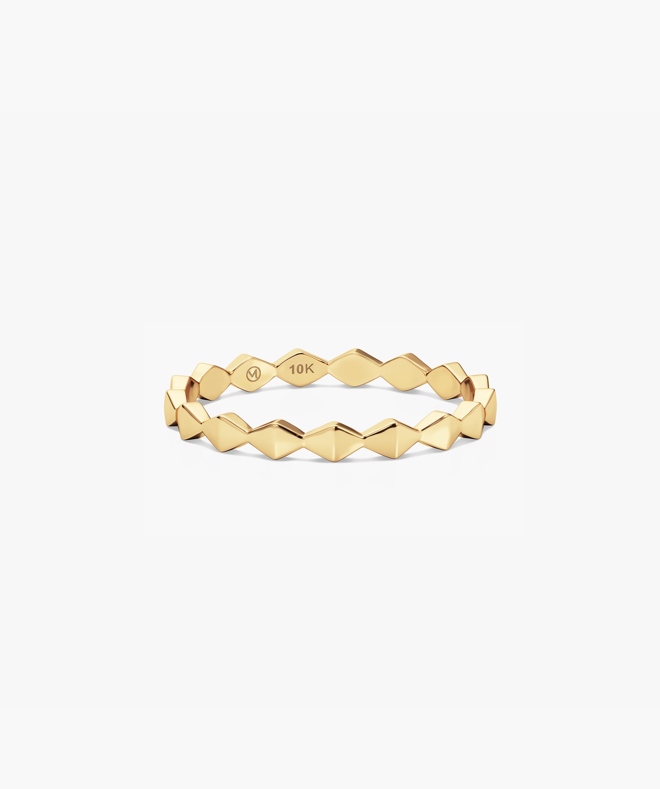 Sculpture Ring: A 10-karat yellow-gold stacking band with faceted diamond-shaped links, featuring a zig-zag profile, makerâs mark, and â10Kâ purity stamp inside.