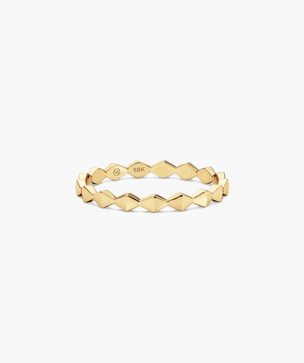 Sculpture Ring: A 10-karat yellow-gold stacking band with faceted diamond-shaped links, featuring a zig-zag profile, makerâs mark, and â10Kâ purity stamp inside.