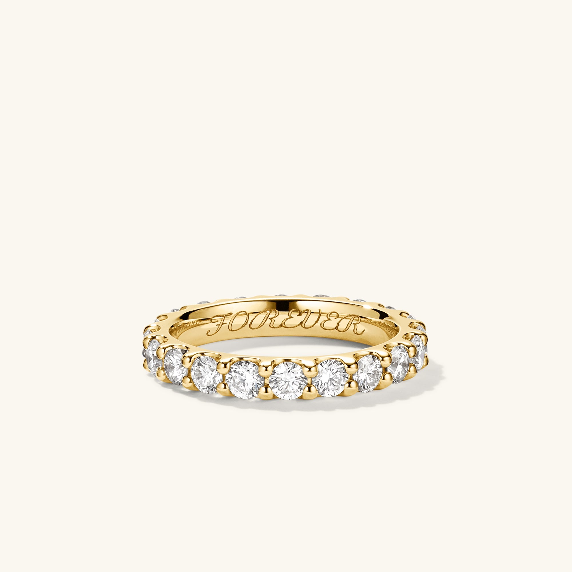 3mm Bold Diamond Eternity Band: Handcrafted 14k gold ring with 22 round brilliant cut diamonds in open prongs to maximize sparkle.