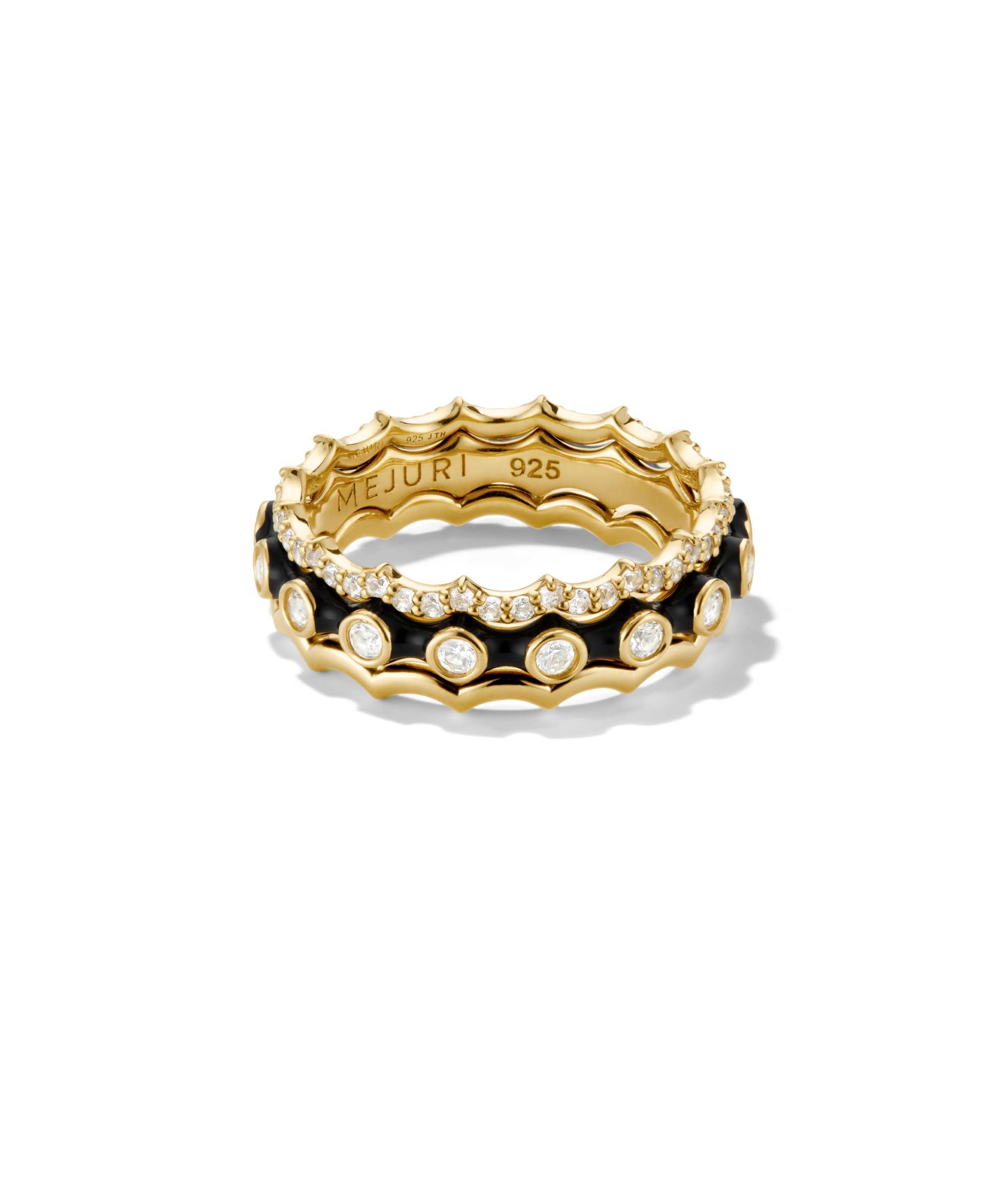 Gemstone Charlotte Stacker Bundle: two stackable gold rings with scalloped edges, featuring pavÃ© and bezel-set white stones, contrasting with a black enamel background.