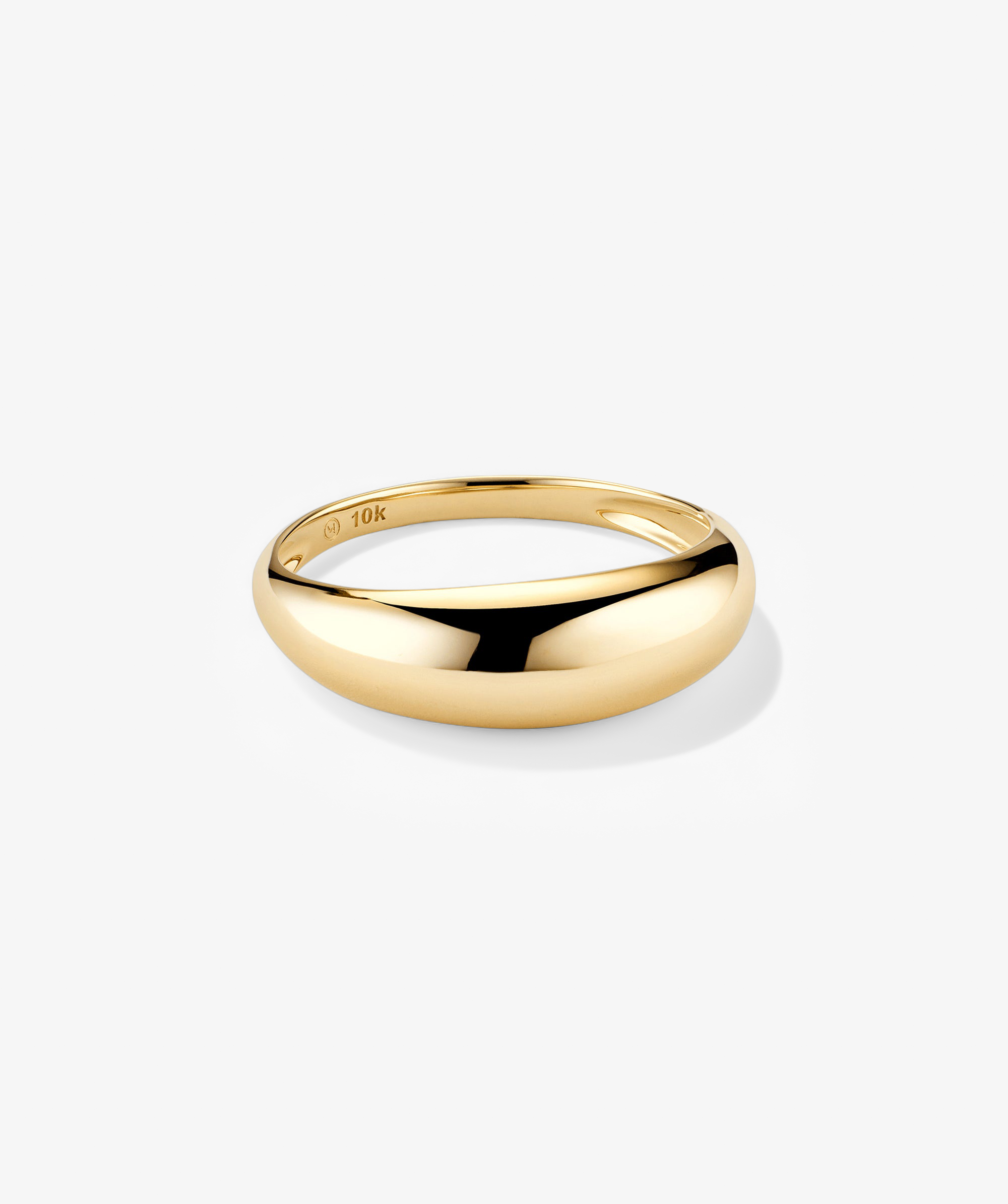 Thin DÃ´me Ring, a polished yellow-gold 10k band, showcases a classic dome design, perfect for stacking or wearing alone, embodying Mejuri's elegant craftsmanship.