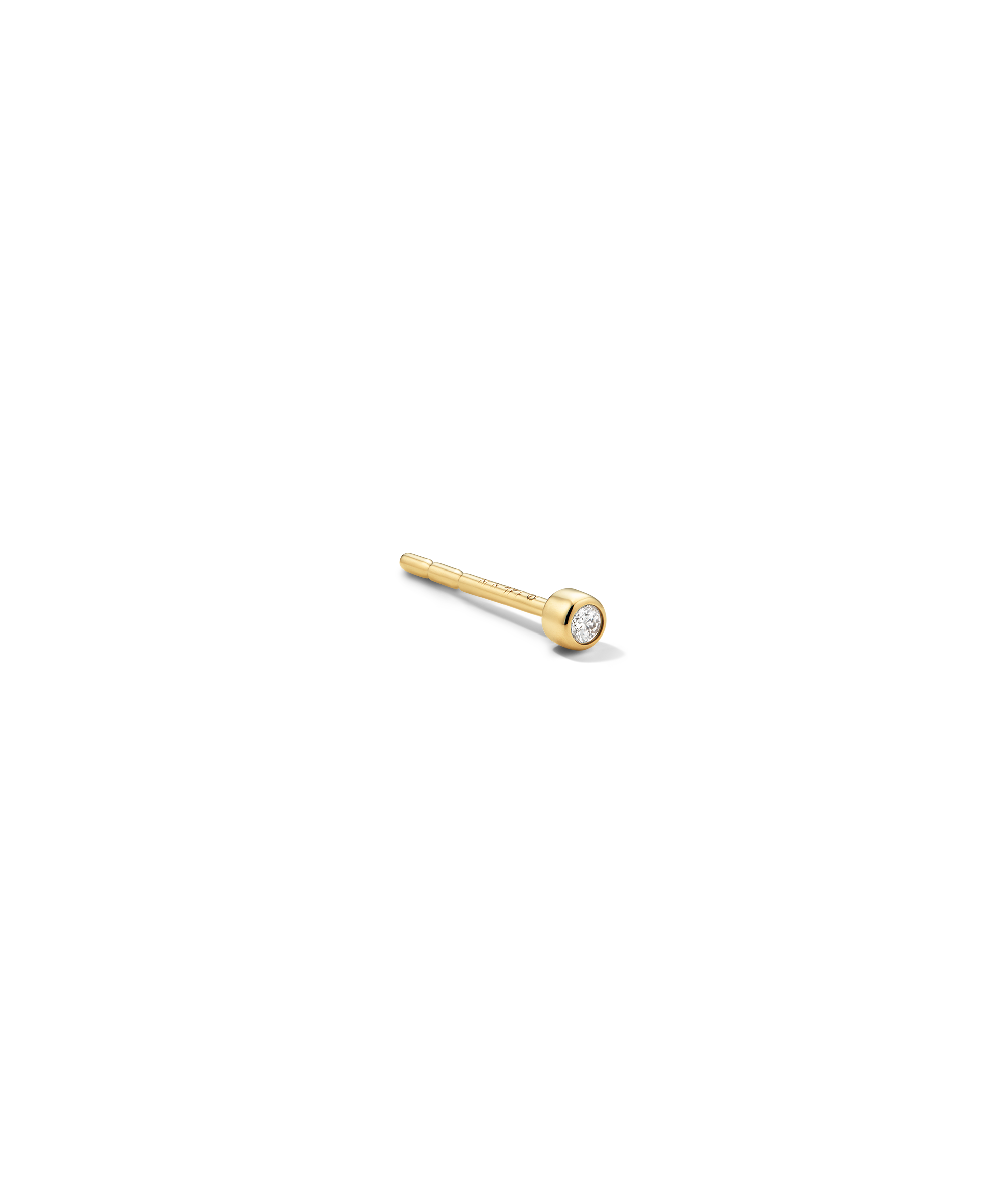 Tiny Diamond Stud featuring a bezel-set diamond on a polished gold circle. Includes grooved post for fit and flat back for comfort.