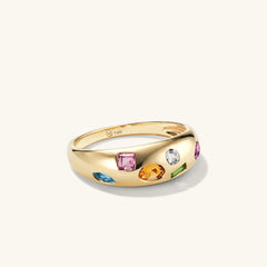 Toronto Mosaic DÃ´me Ring: A 14k gold ring featuring six gemstones in various cuts, inspired by mosaic art and Toronto's six boroughs.