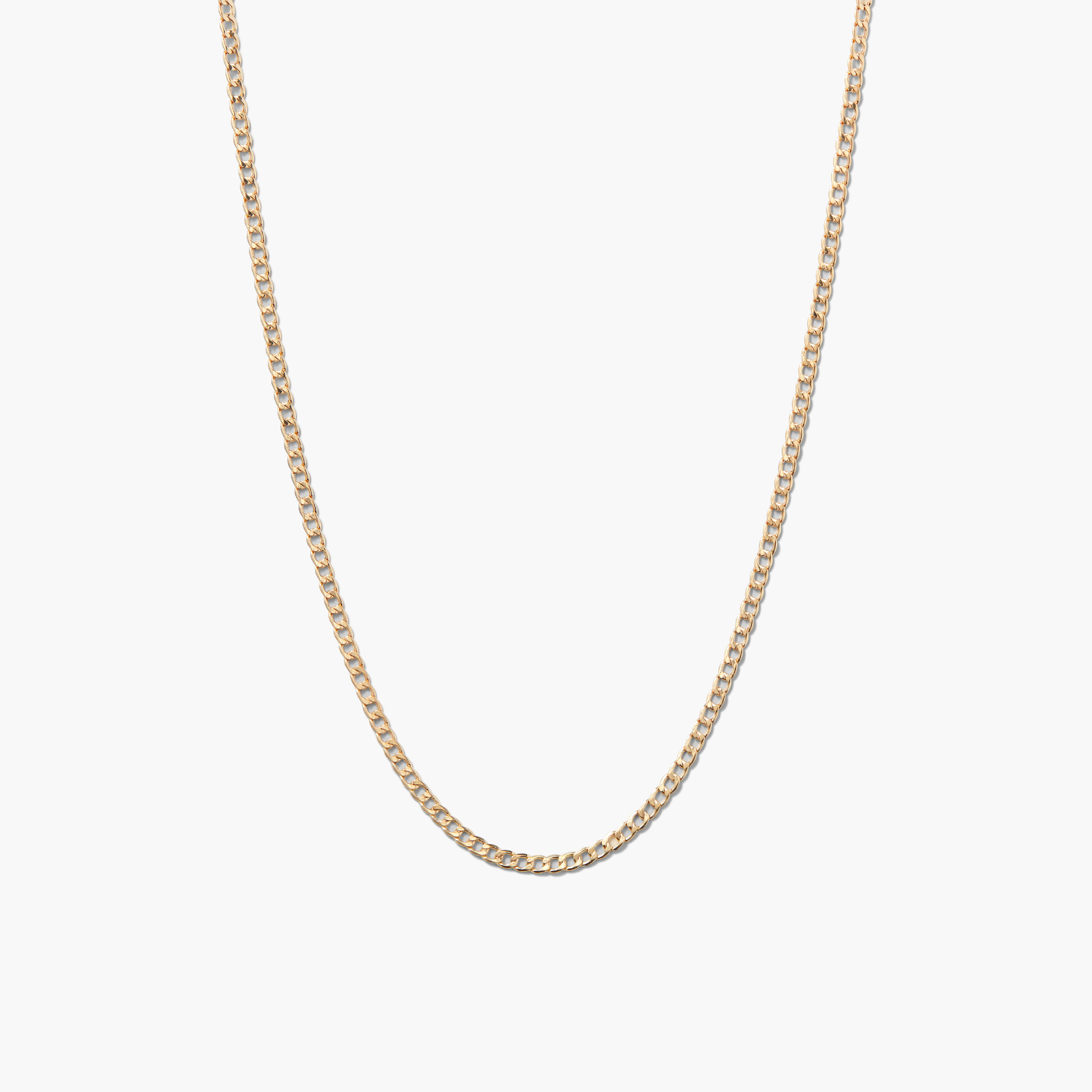 Flat Curb Chain Necklace: A sleek gold chain with a minimalist design, perfect for everyday wear and elevating any outfit.