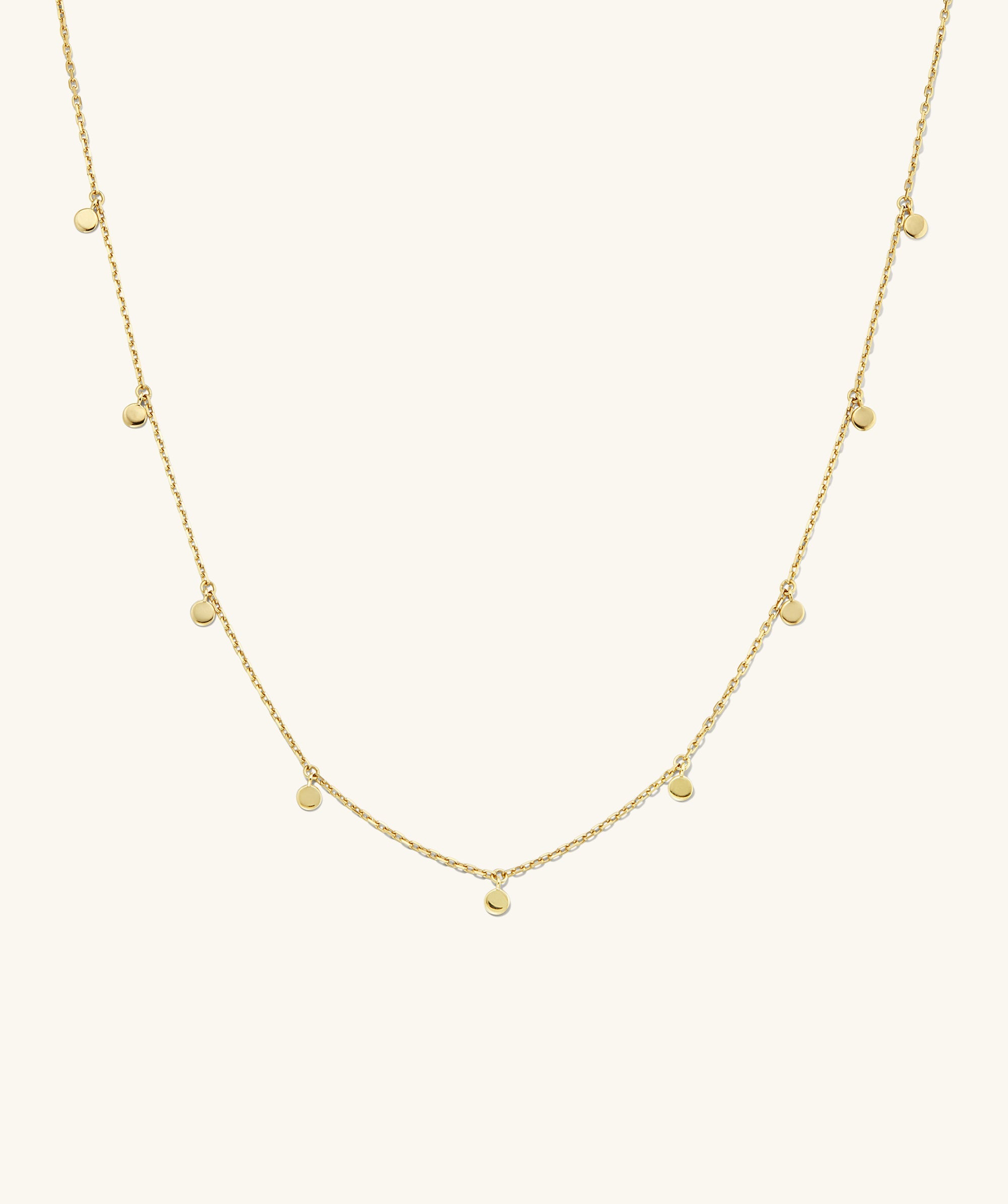 Dot Chain Necklace featuring mini golden dots, designed to enhance your layered look with added dimension and style. Perfect for stacking with other pieces.