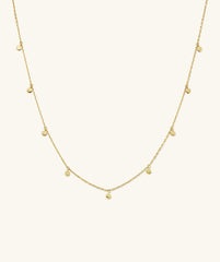 Dot Chain Necklace featuring mini golden dots, designed to enhance your layered look with added dimension and style. Perfect for stacking with other pieces.