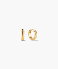 Charlotte Textured Huggie Hoops; small, ribbed gold earrings with a polished finish, one closed, the other open, showcasing a hinged design.