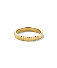 Bold Eternity Line Band: A slim, gold-plated ring with a fluted texture. Stamped â925 N,â indicating sterling silver beneath the gold finish.