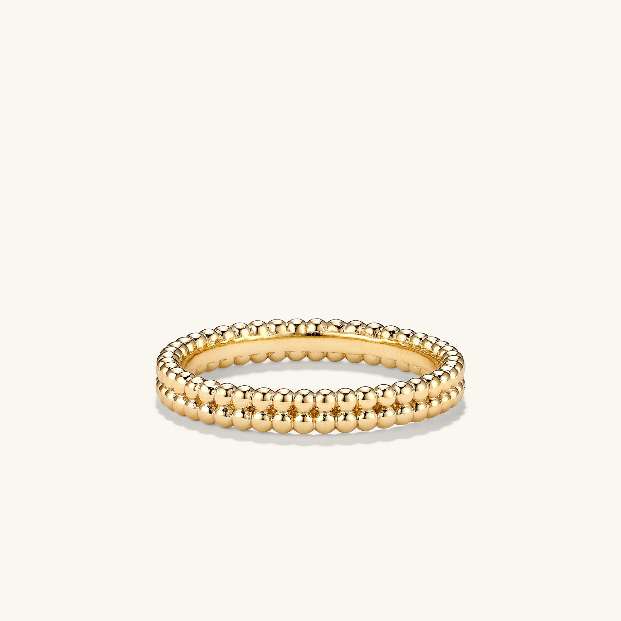 Duo Beaded Stacker Ring: A handcrafted 18k gold vermeil ring featuring double rows of textured beads, ideal for stacking and enhancing any jewelry collection.