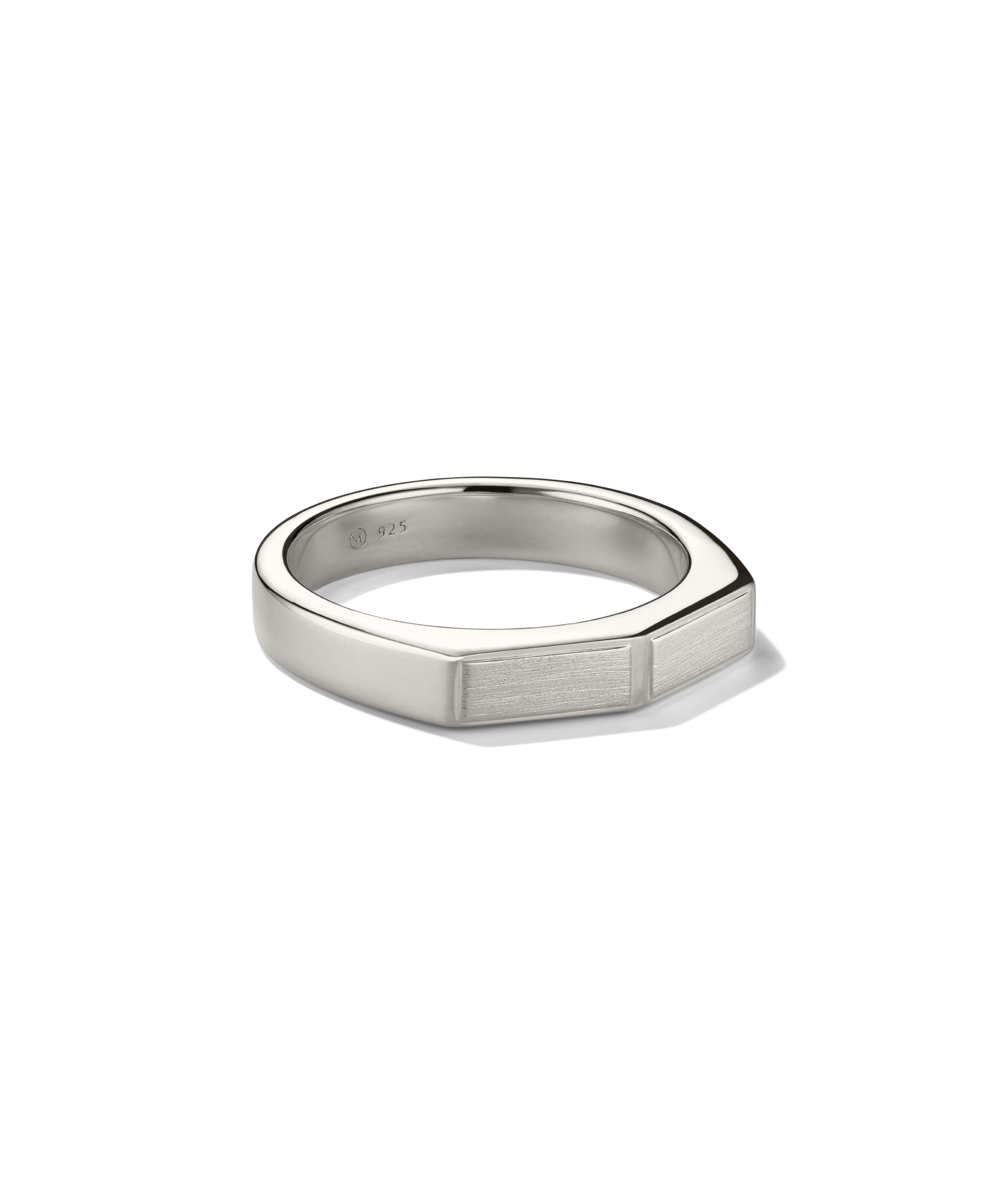 Slim Faceted Ring: A modern sterling-silver band with a minimalist geometric top, featuring a 925 stamp inside, displayed against a black background.