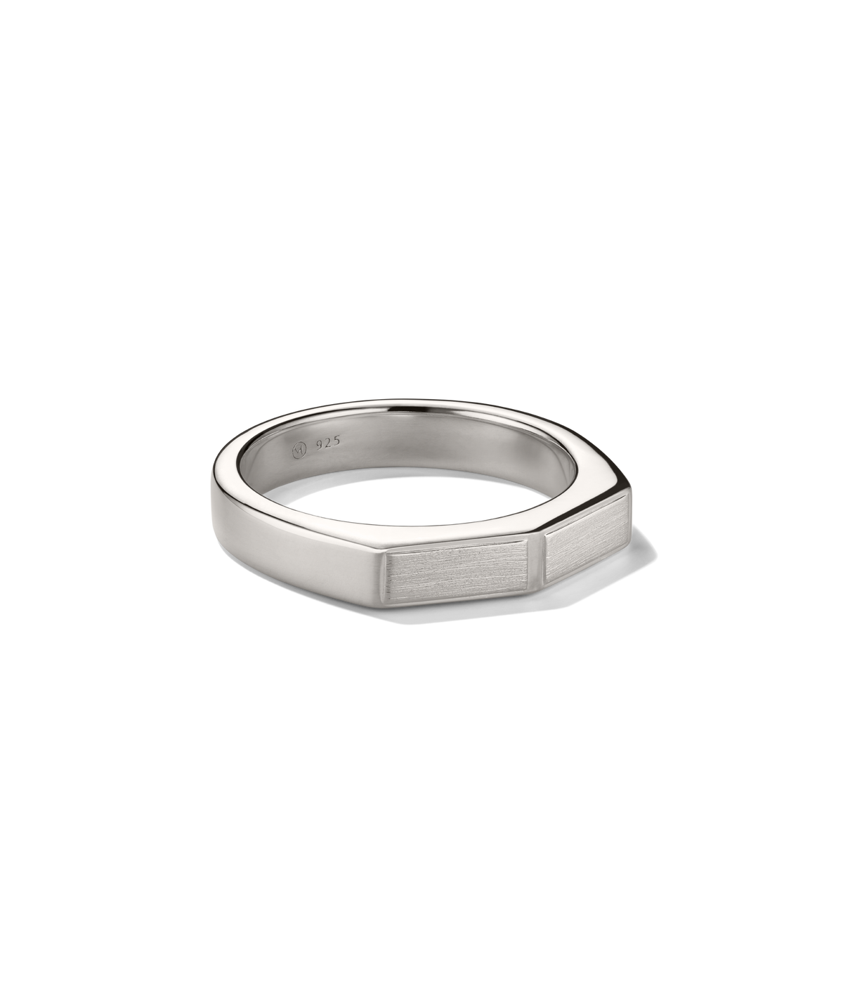 Slim Faceted Ring: A modern sterling-silver band with a minimalist geometric top, featuring a 925 stamp inside, displayed against a black background.