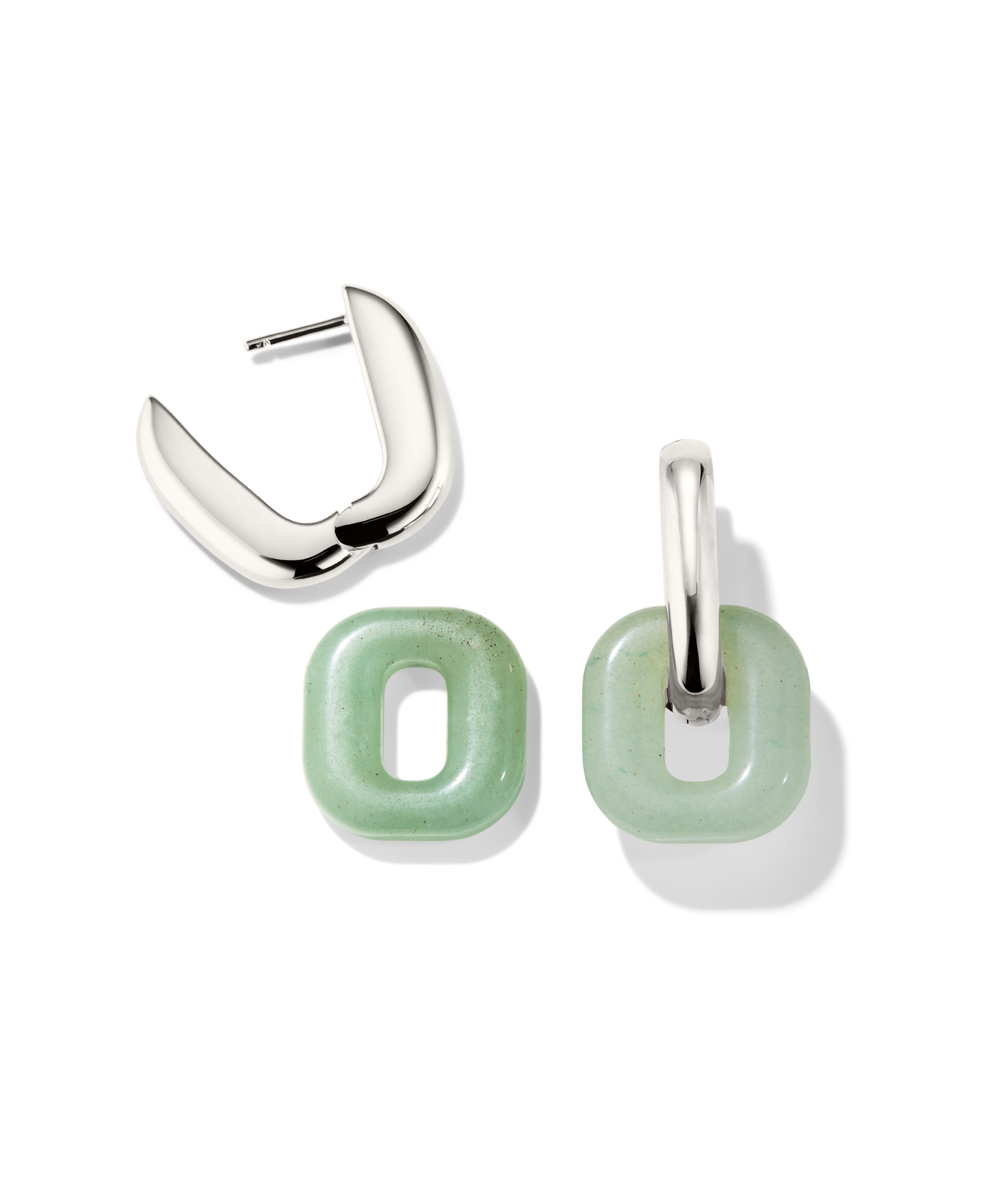 Stevie Hoop Links shown in an exploded view: polished silver hoops with removable pale green stone charms, illustrating interchangeable style options.