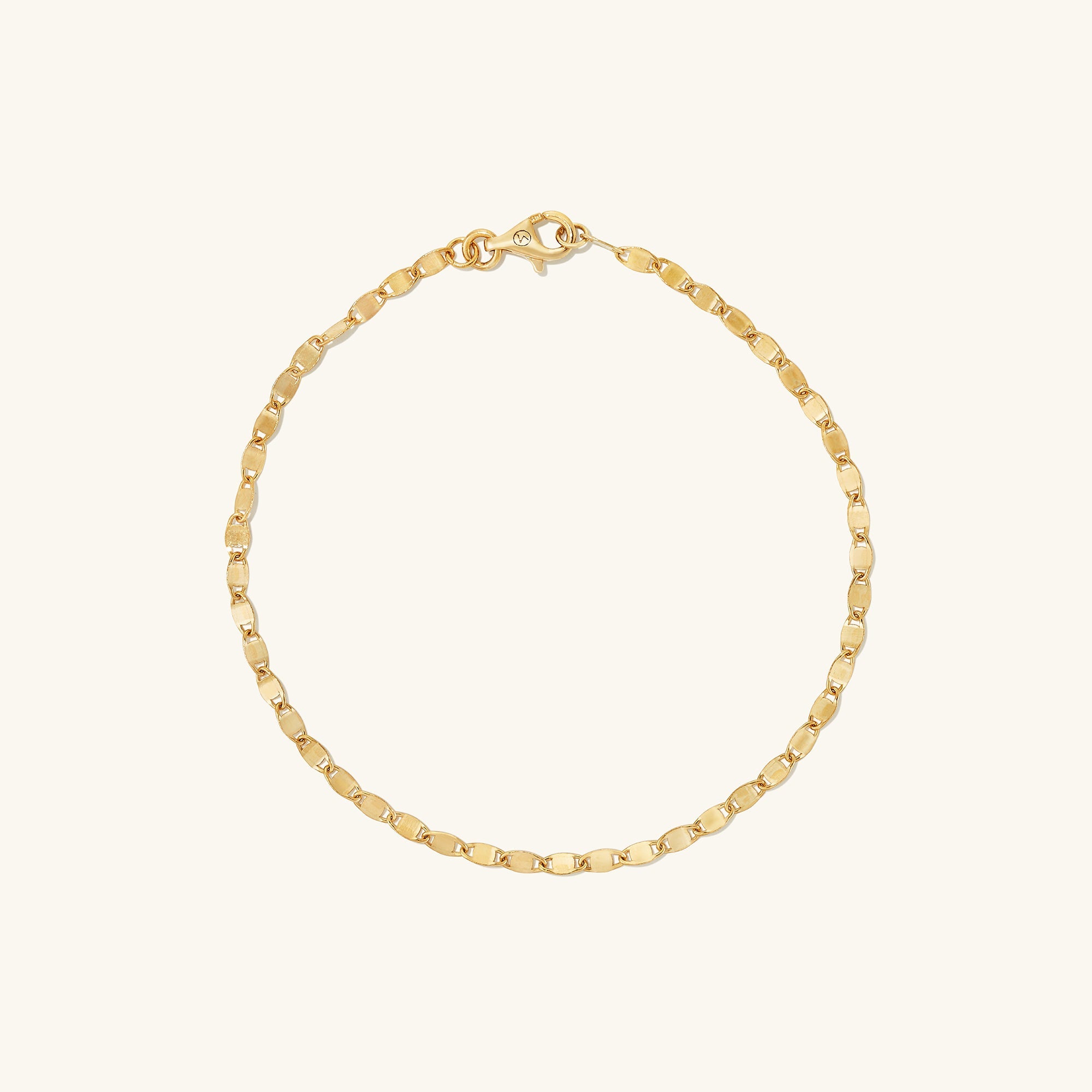 Anchor Chain Anklet: 14k solid gold chain with interlinked design, resembling a ship's anchor chain, displayed on a plain white background.