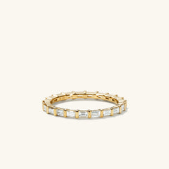 Baguette Diamond Eternity Band in 14k gold, set with Kimberley Process-certified diamonds, showcasing a continuous row of sparkling baguette-cut stones.