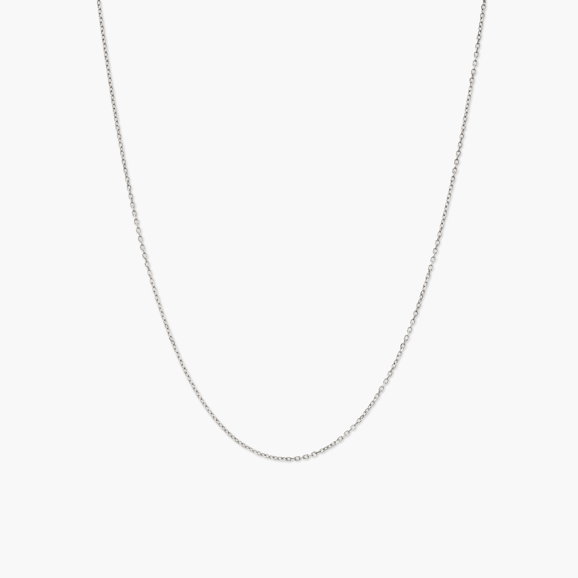 Chain Necklace featuring a prominent silver cross, ideal for layering with other necklaces or chokers for a versatile look.