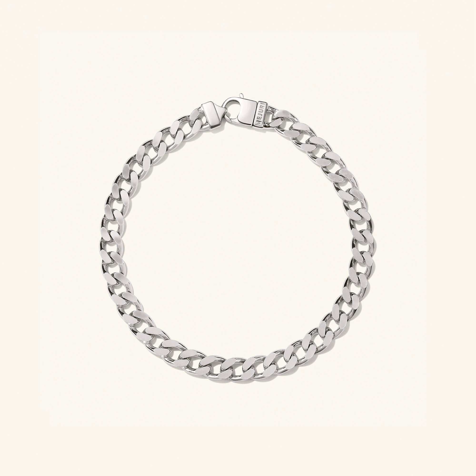 Silver Curb Chain Bracelet with a clasp, designed for everyday wear. Style it solo or double up for a bold statement.