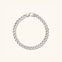 Silver Curb Chain Bracelet with a clasp, designed for everyday wear. Style it solo or double up for a bold statement.