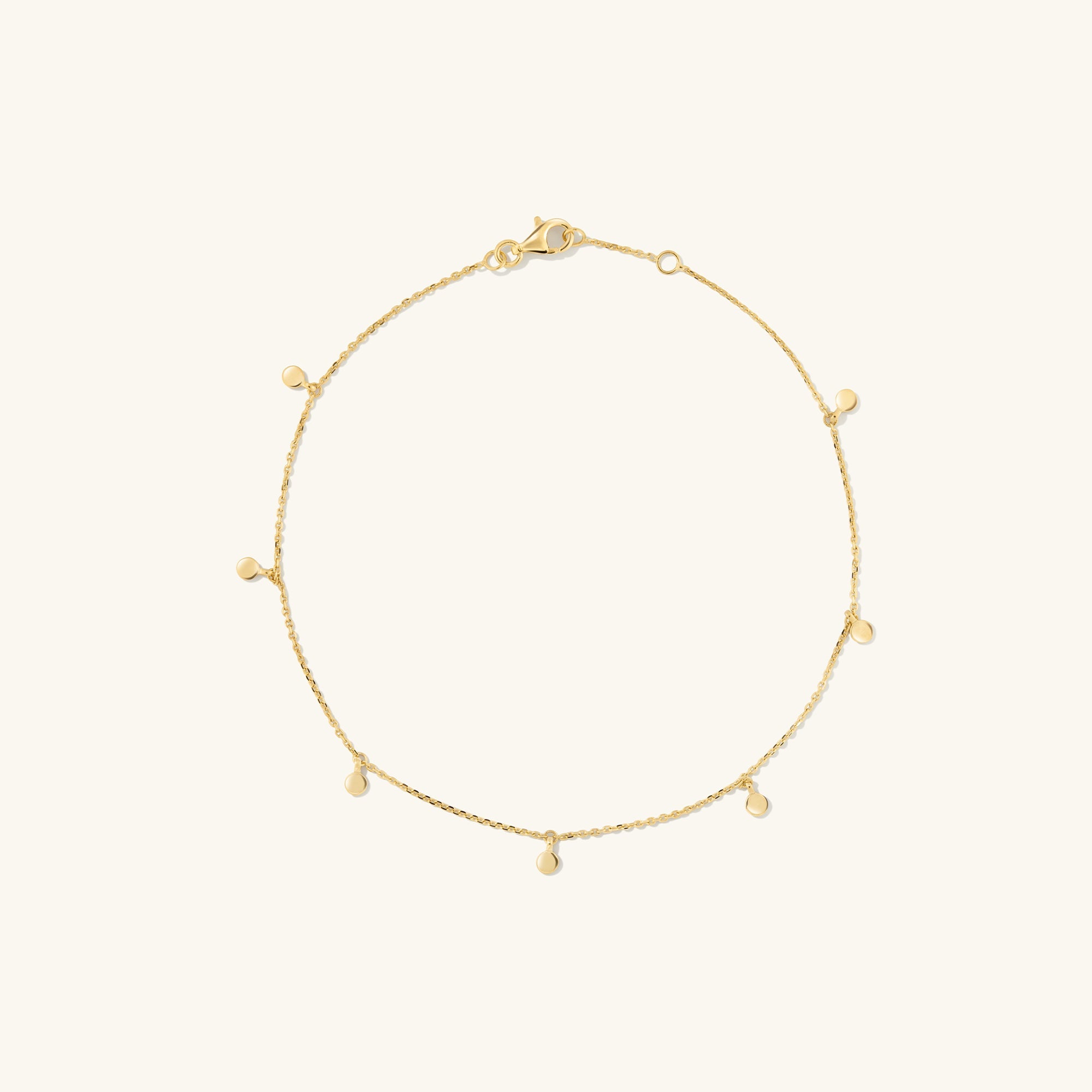 Dot Chain Anklet: A handcrafted 14k solid gold anklet featuring a delicate chain with small dots and a clasp. Ideal for stacking in your jewelry collection.
