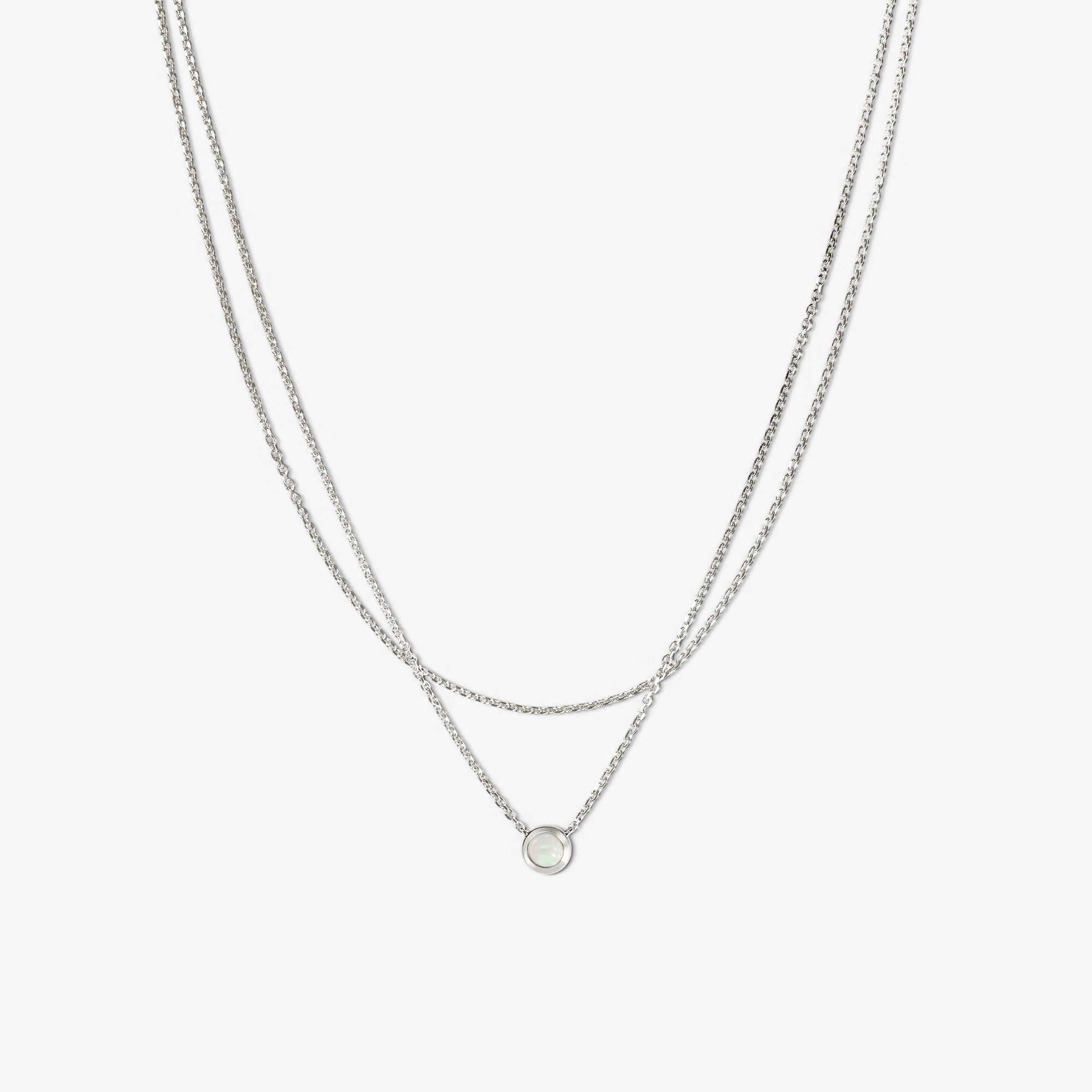 Layered Opal Necklace featuring two chains seamlessly bound with a round opal pendant, ideal for adding a touch of elegance to any outfit.