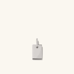 Pave Diamond Bail Tag Charm Pendant: A silver rectangular pendant adorned with pavÃ© diamonds on the bail, offering a timeless, elegant style for personalization.