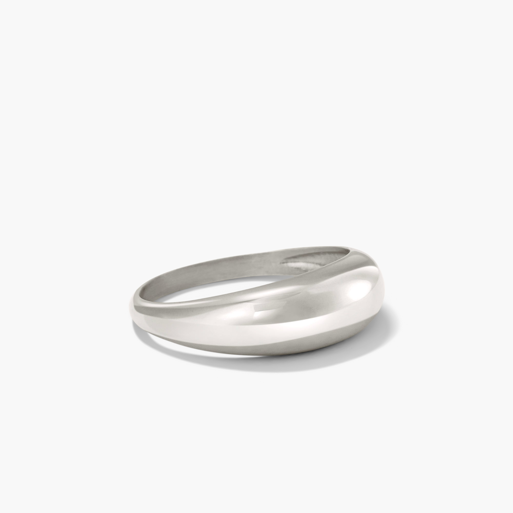 Thin DÃ´me Ring: A silver, ultra-light handcrafted ring with a bold, curved edge design, perfect for stacking with daintier rings.
