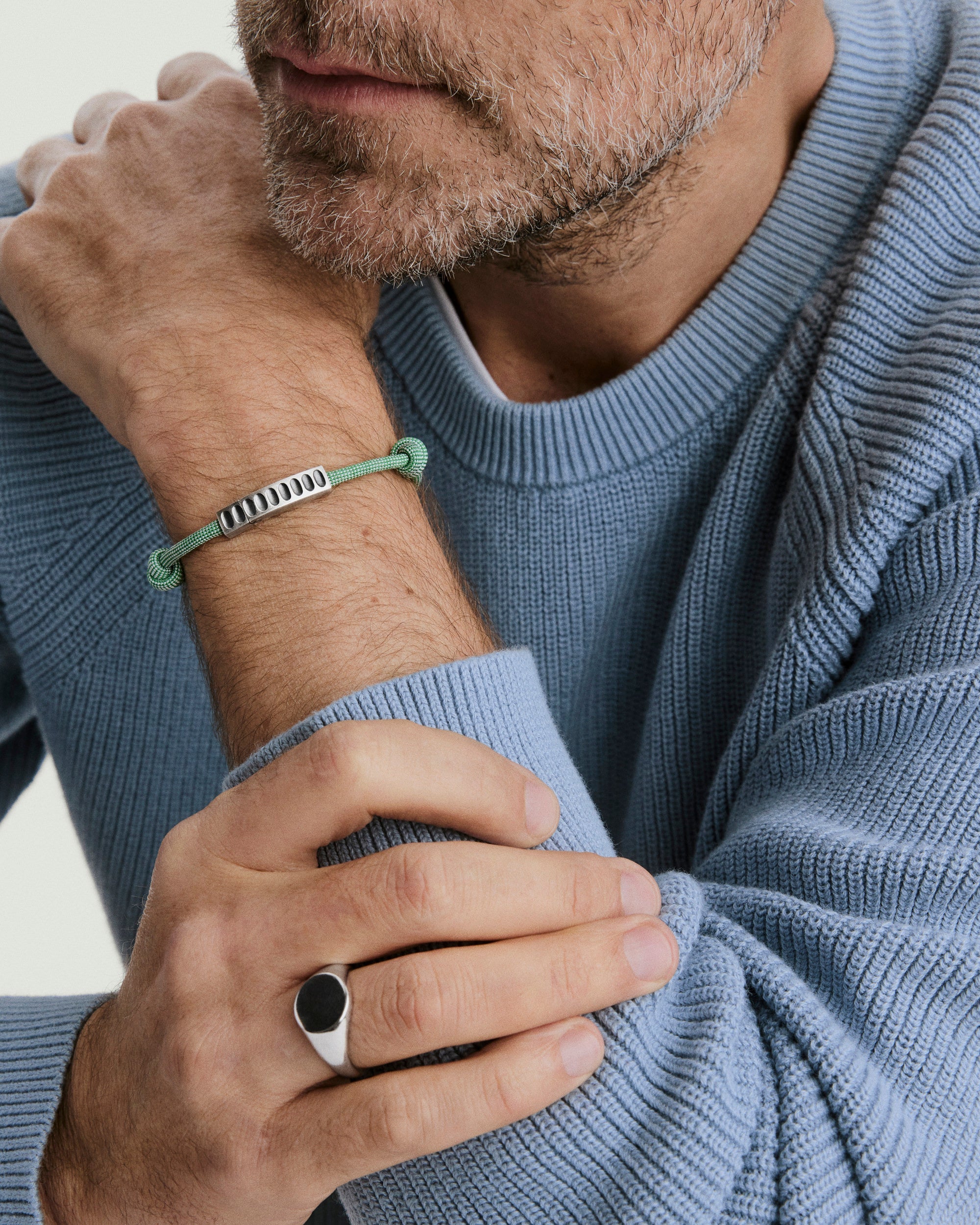 Colosseum Cord Bracelet featuring a metal and cord design, inspired by the classic Charlotte collection, ideal for adventurous outings.