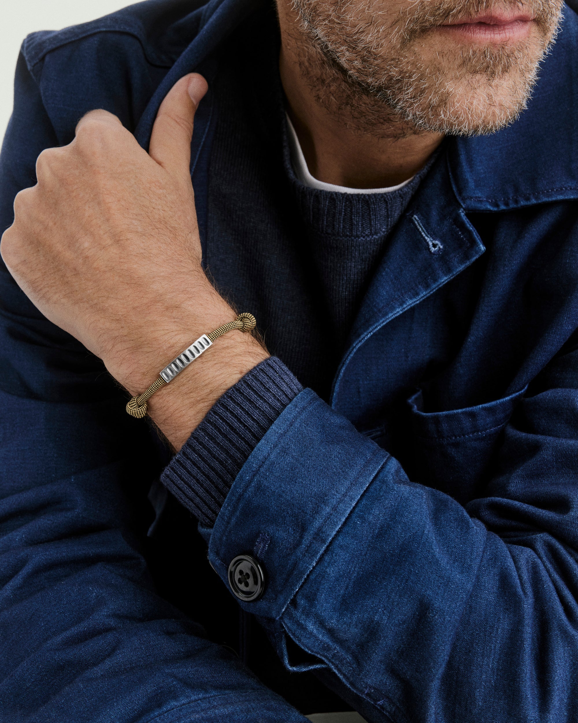Colosseum Cord Bracelet featuring a striking metal and cord design from the Charlotte collection, perfect for adventurous wear.