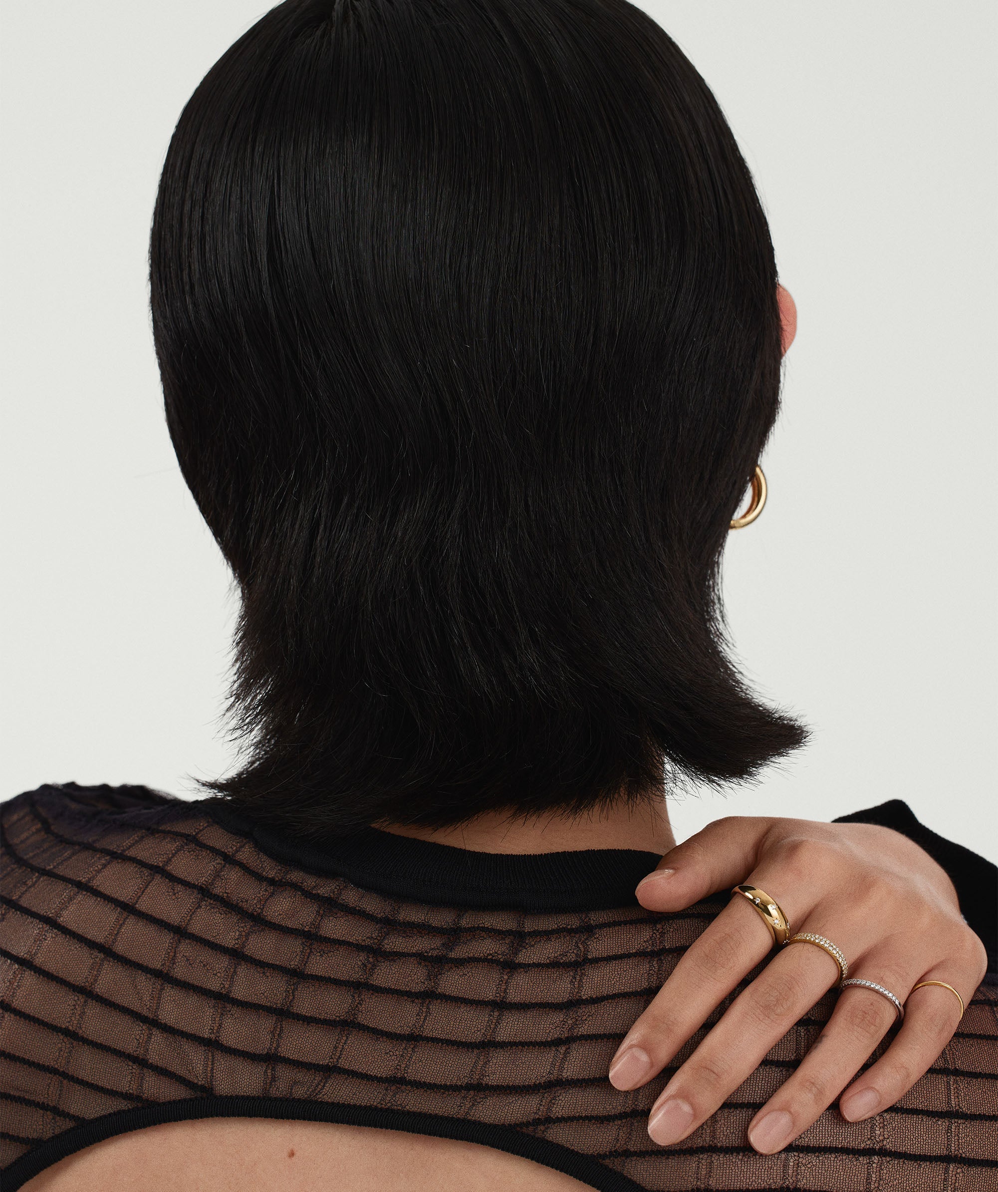 Celestial DÃ´me Ring showcased on a woman's hand, highlighting its elegant design with intricate details, exuding glamour and sophistication.