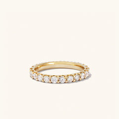Bold Diamond Eternity Ring: 14k gold ring with 23 round brilliant cut diamonds in open prong settings, designed for maximum sparkle.