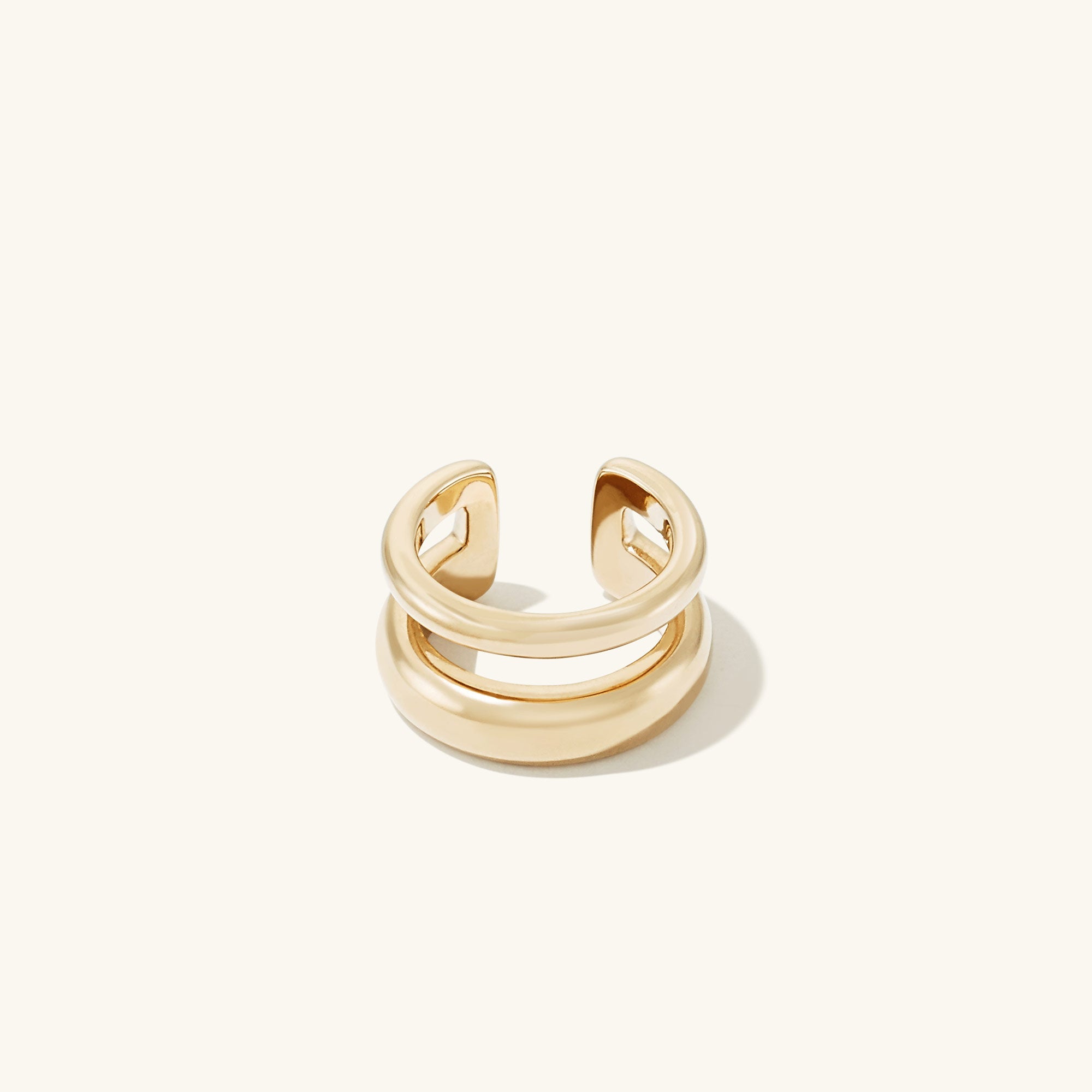 Duet Ear Cuff in gold vermeil, featuring a sleek, double-ring design for a stylish, non-pierced look. Handcrafted with an 18k gold layer over sterling silver.