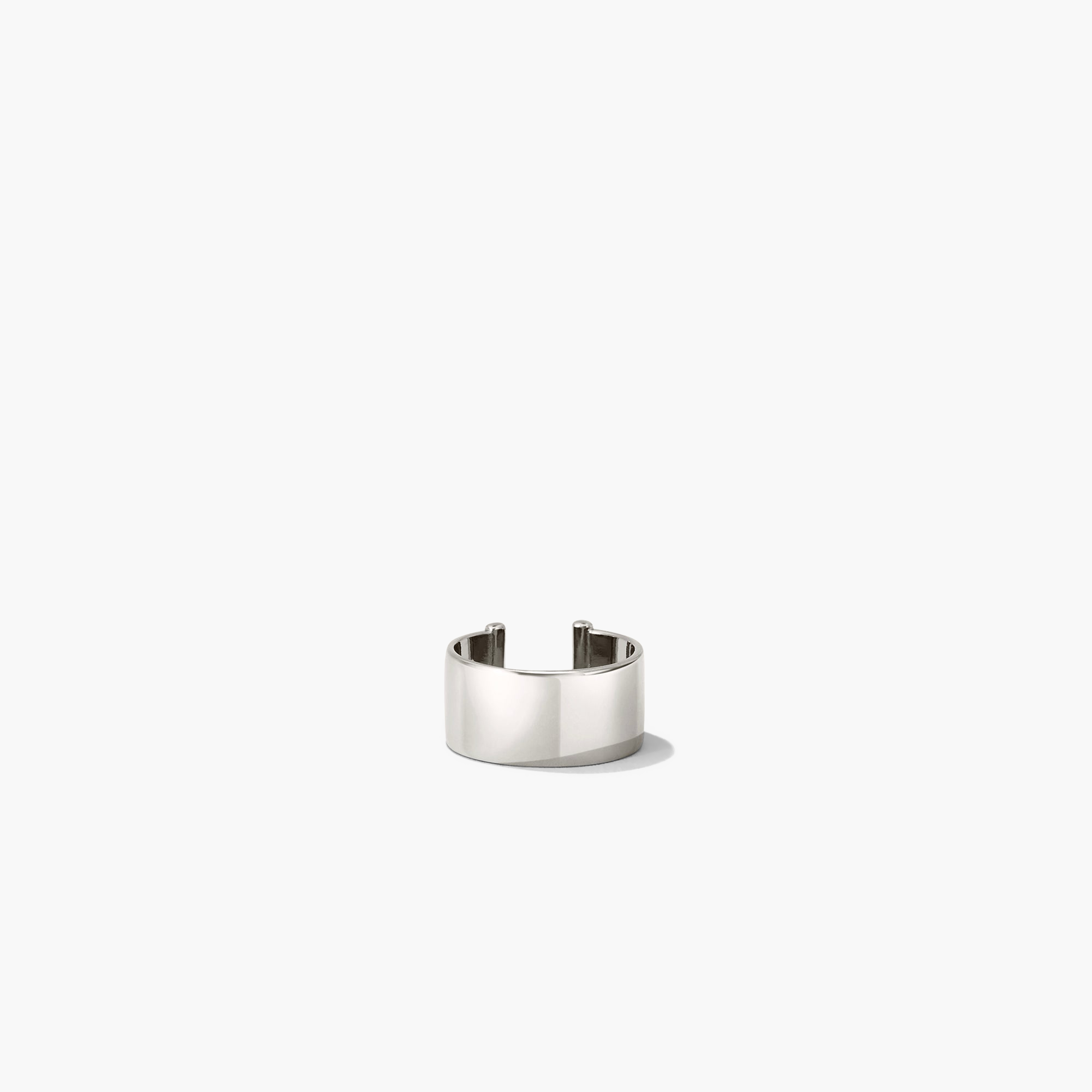Daily Ear Cuff: A polished, high-shine silver ring on a white background, embodying timeless elegance and handcrafted in vermeil with an 18k gold layer.