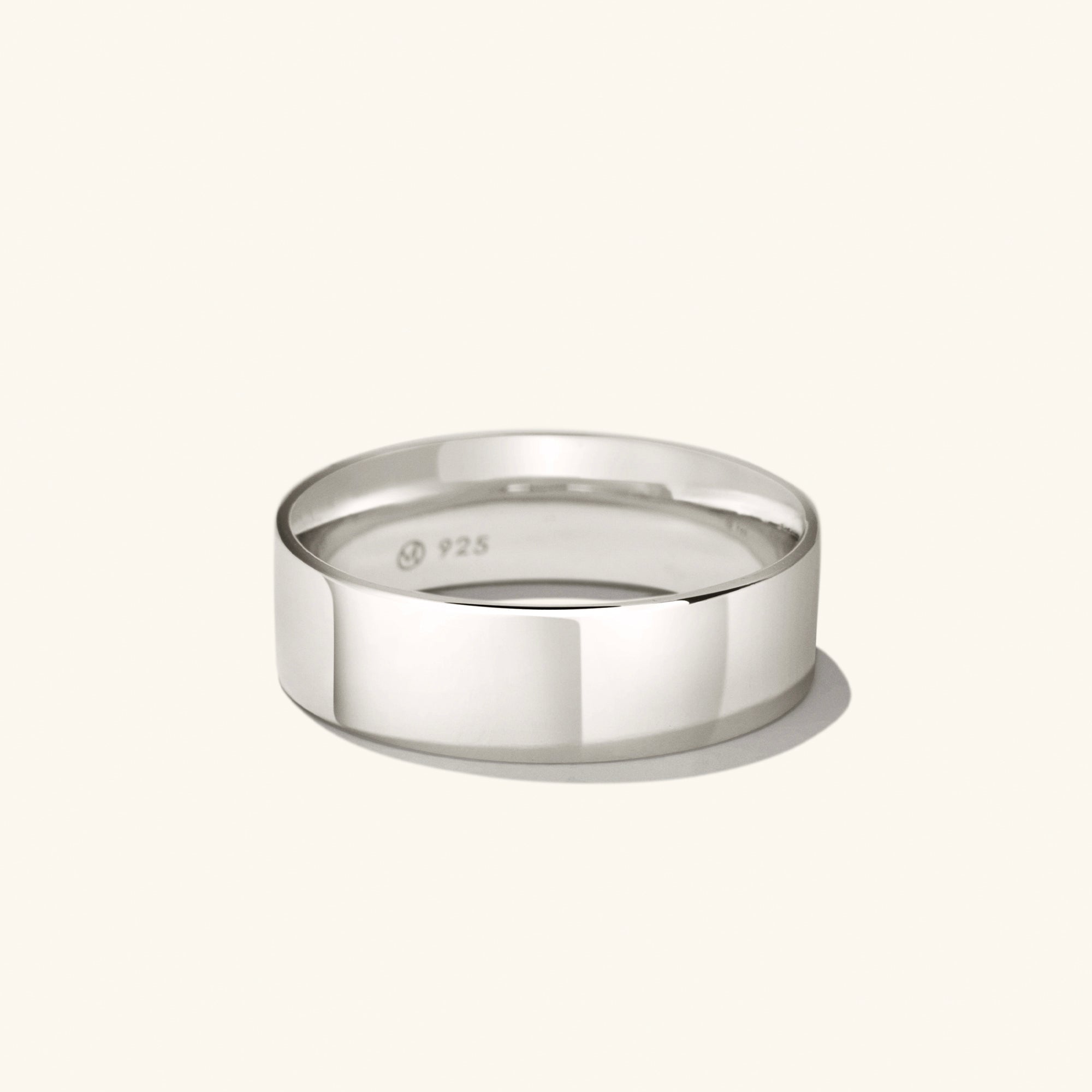 Daily Stacker Ring featuring a sleek silver design, displayed on a white background, ideal for minimalist style and effortless daily wear.