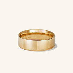 Gold Daily Stacker Ring, featuring a sleek and minimalist design, ideal for layering or wearing alone as a fashion accessory.