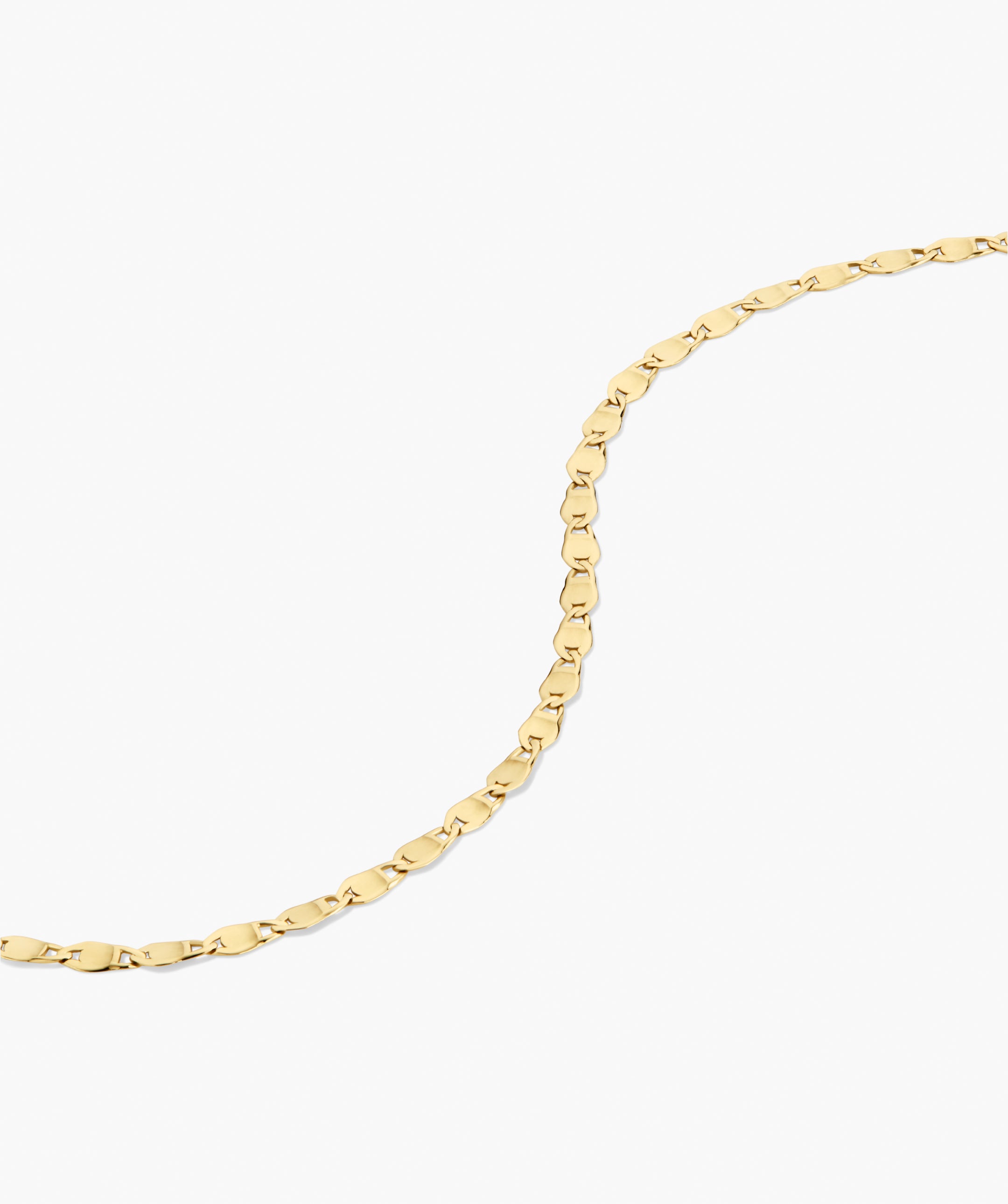 Mini Anchor Chain Necklace with polished, flat interlocking links, elegantly laid against a white background, ideal for layering or wearing alone.