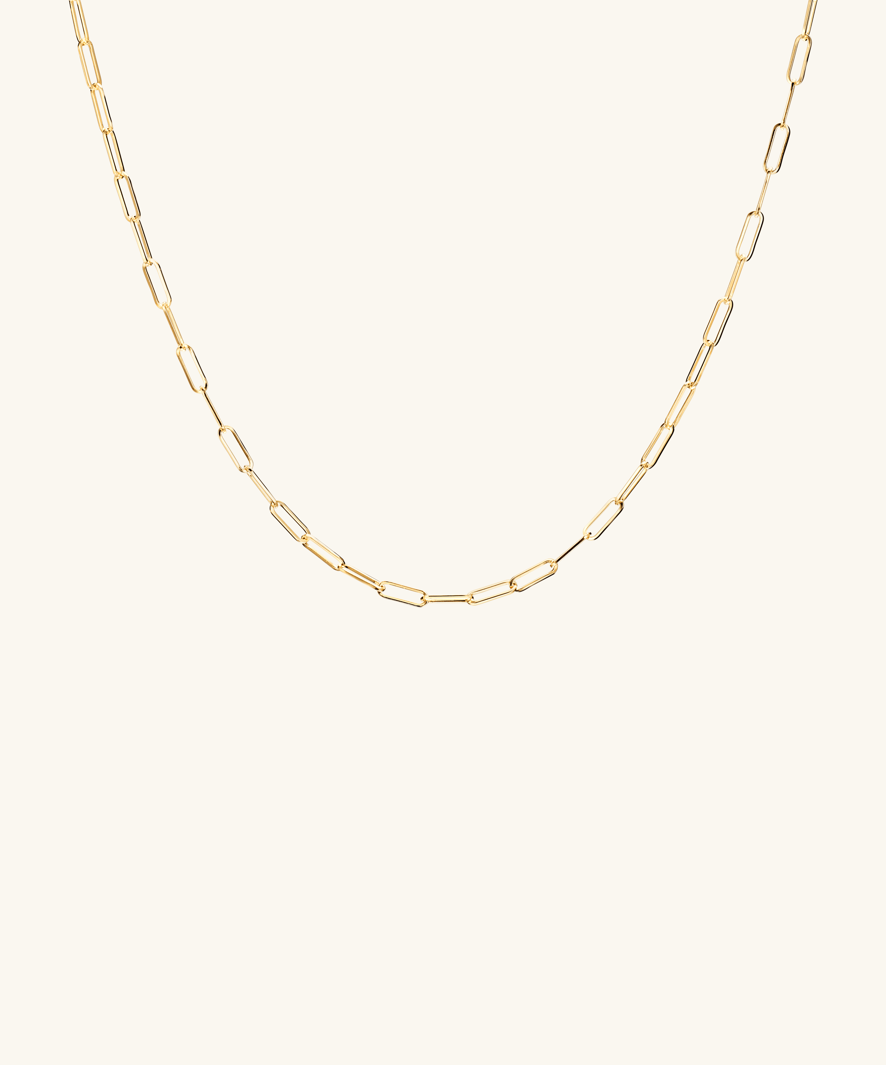 Oval Charm Enhancer: A gold chain necklace designed for charm additions, offering versatile styling options.