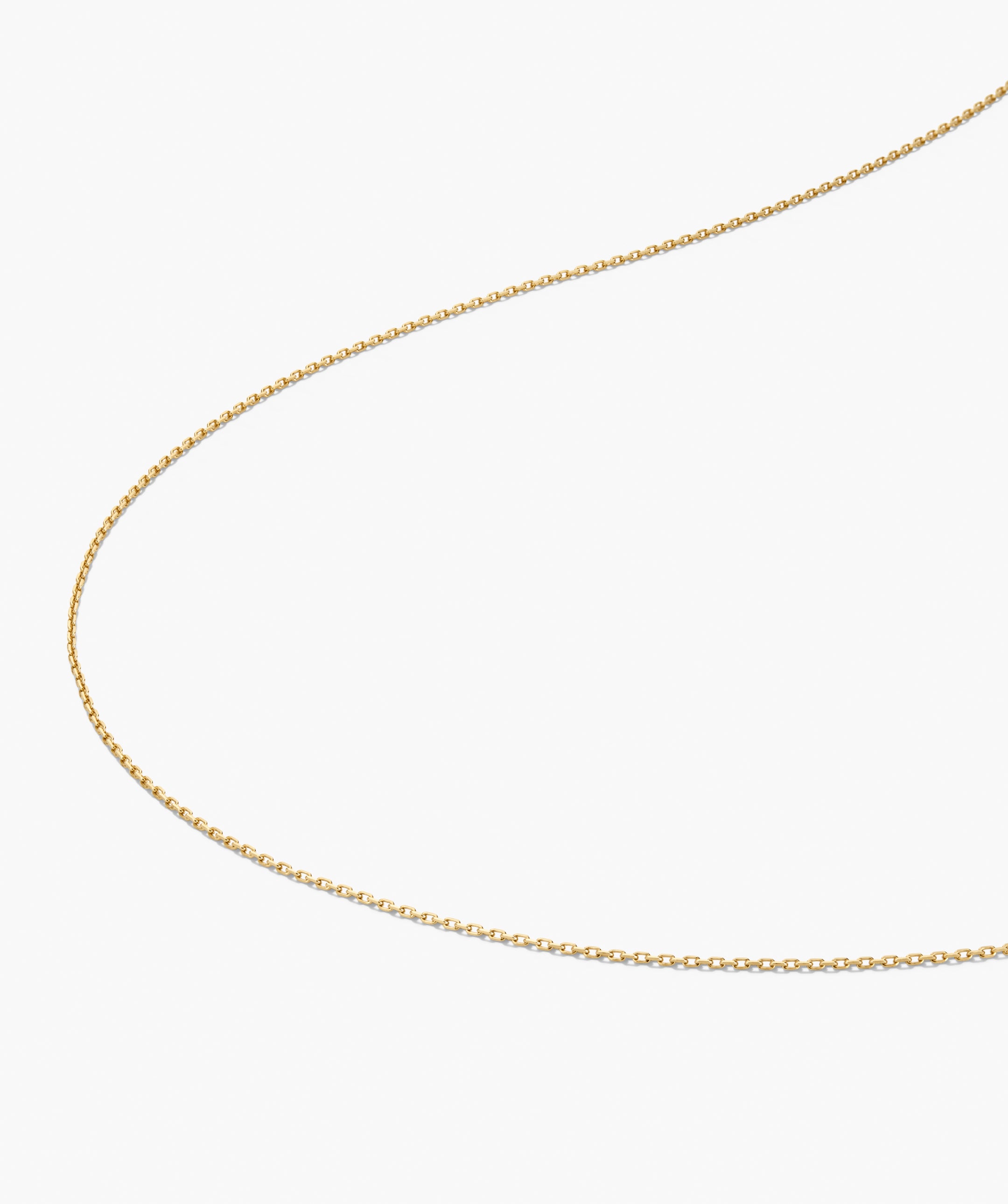 Oval Link Chain Necklace with fine ovular links, ideal for adding charms or layering, displayed on a plain white background. Perfect for creating a personalized necklace stack.