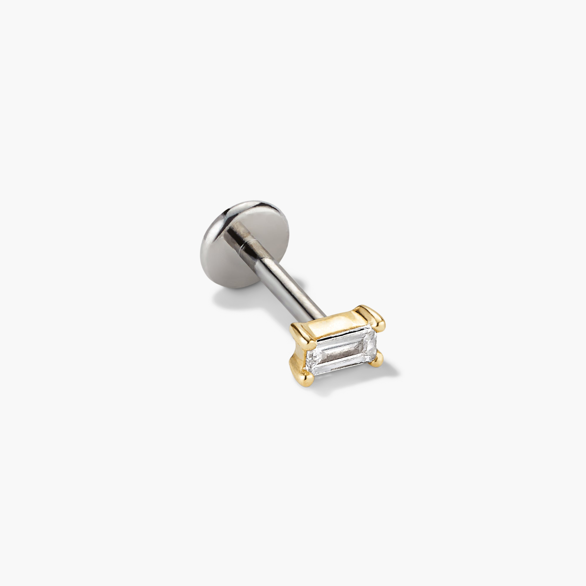 Mini Baguette Stud earring, featuring a baguette cut diamond, designed as a flat back stud for comfort, ideal for starting or completing an ear stack.