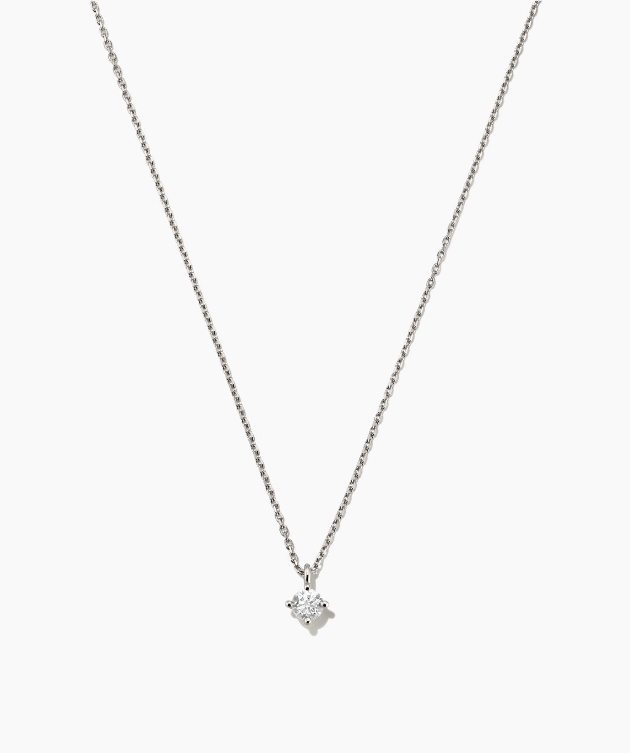 Round Lab Grown Sapphire Necklace featuring a solitaire round-cut stone in a four-prong setting on a delicate silver chain, perfect for versatile elegance.