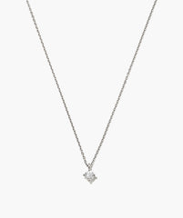 Round Lab Grown Sapphire Necklace featuring a solitaire round-cut stone in a four-prong setting on a delicate silver chain, perfect for versatile elegance.