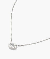 Lucia Necklace: A delicate chain featuring an oval bezel-set lab grown sapphire pendant, designed to be the centerpiece of any ensemble.