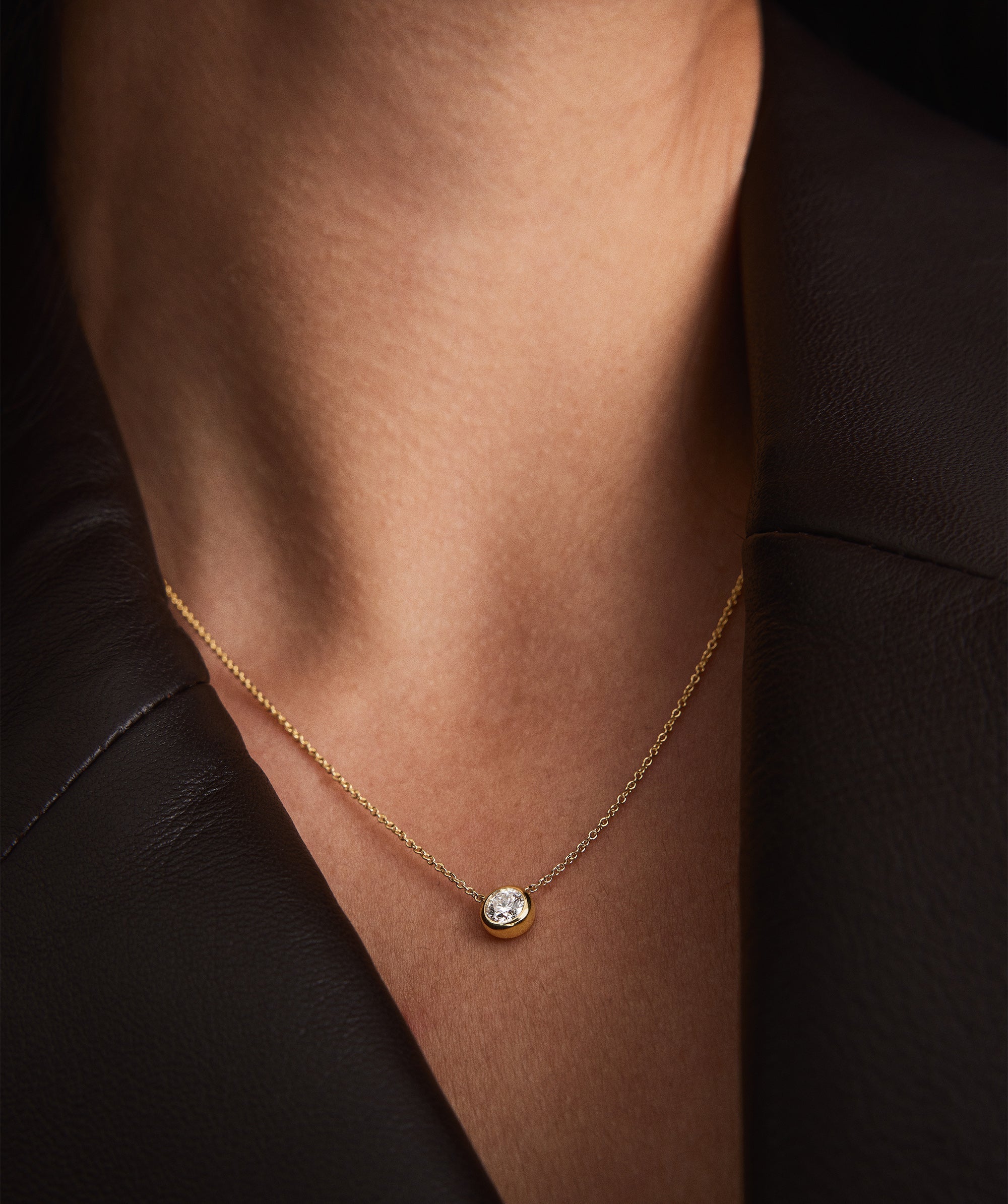 Person wearing the Large Diamond Necklace, showcasing its heirloom-worthy design and intricate detailing.