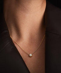 Person wearing the Large Diamond Necklace, showcasing its heirloom-worthy design and intricate detailing.