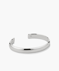 Silver Bold Cuff bracelet featuring a sleek design with a letter 'M' charm, ideal for versatile wear.