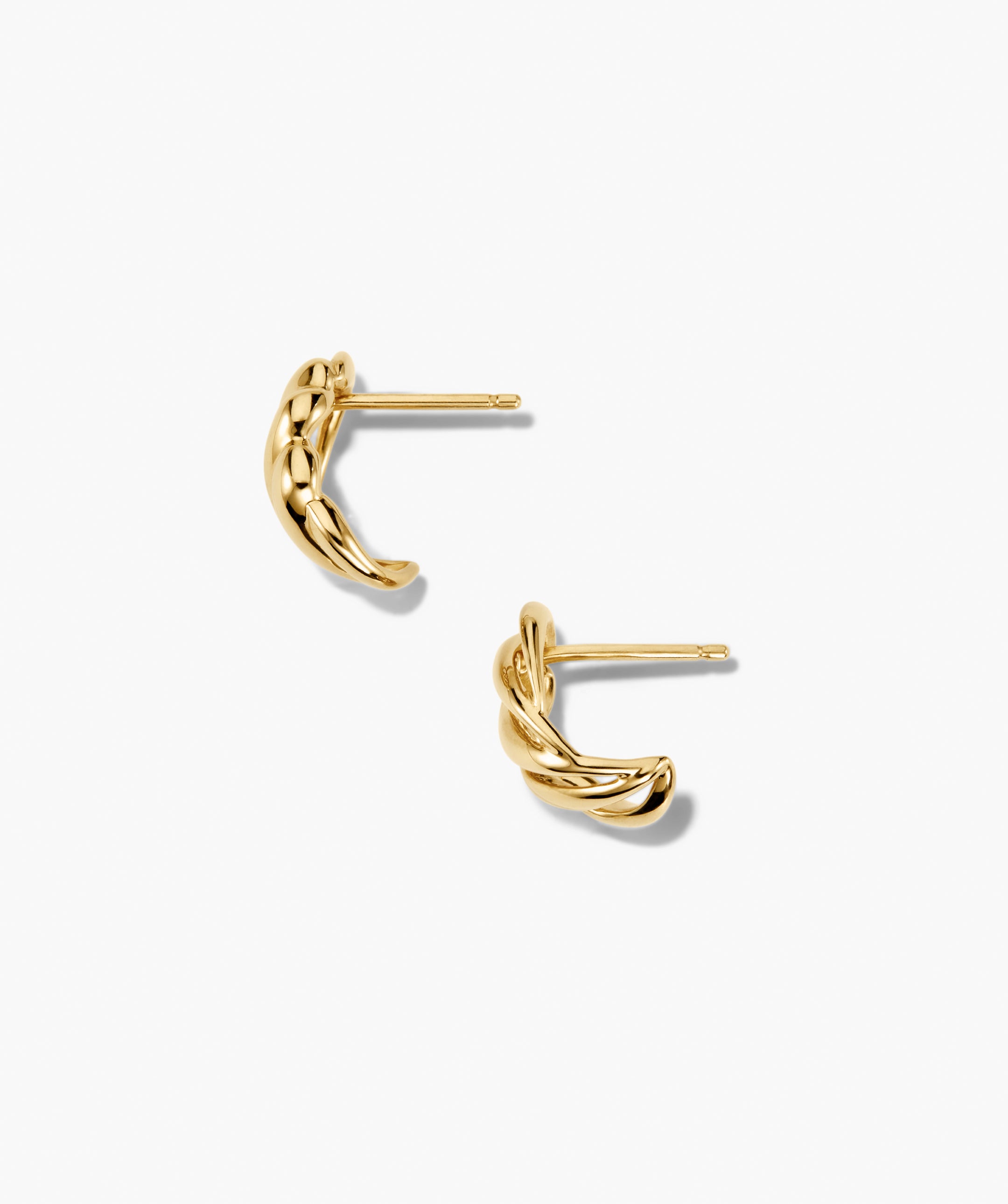 Bold Open DÃ´me Huggies: Small, twisted rope-style half-hoop earrings with a braided design, featuring a straight post backing for a chic, asymmetrical huggie look.