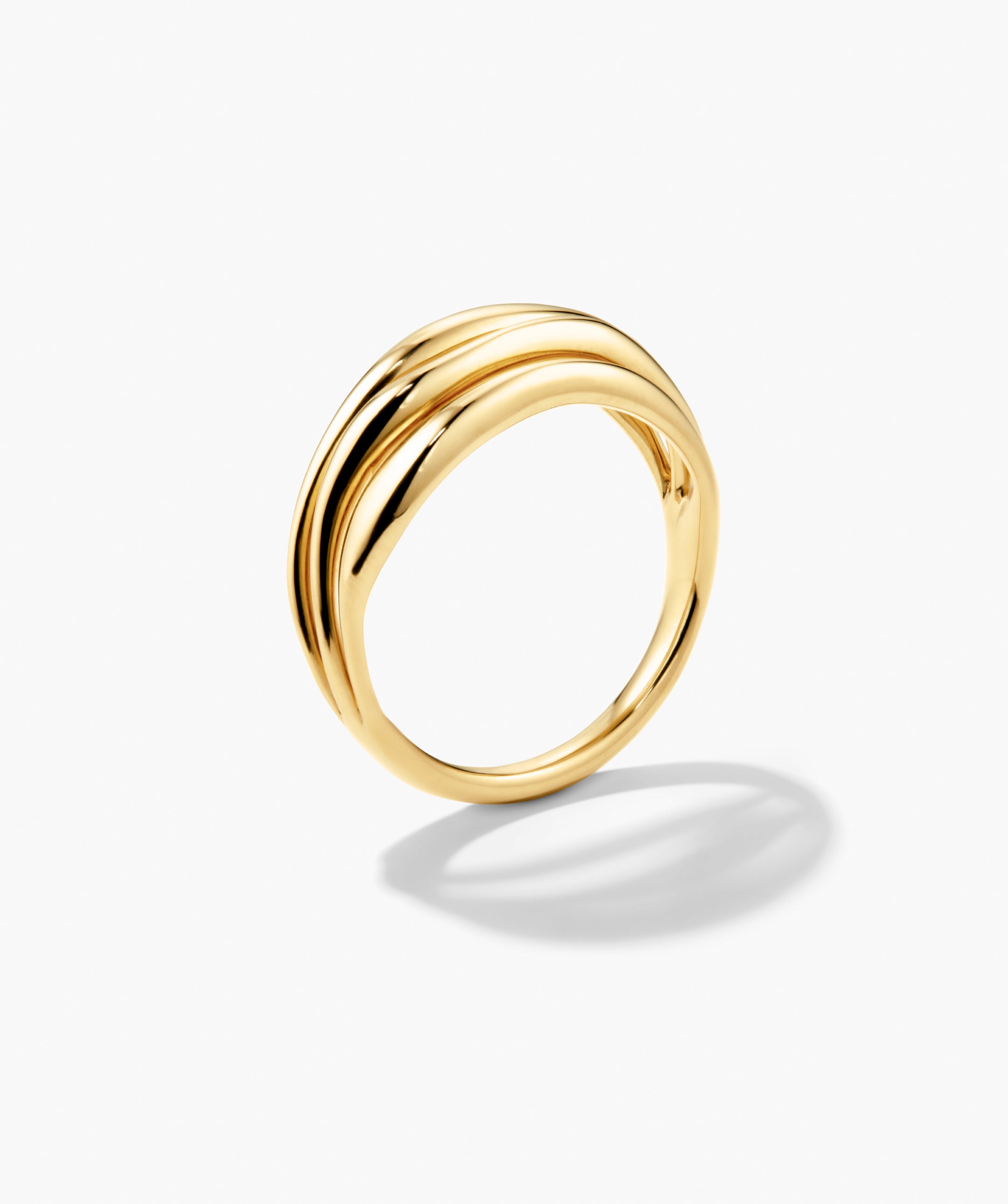 Bold Open DÃ´me Ring: A polished gold band with a wave-like profile, showcasing open spaces and subtle texture for a minimalist yet impactful design.