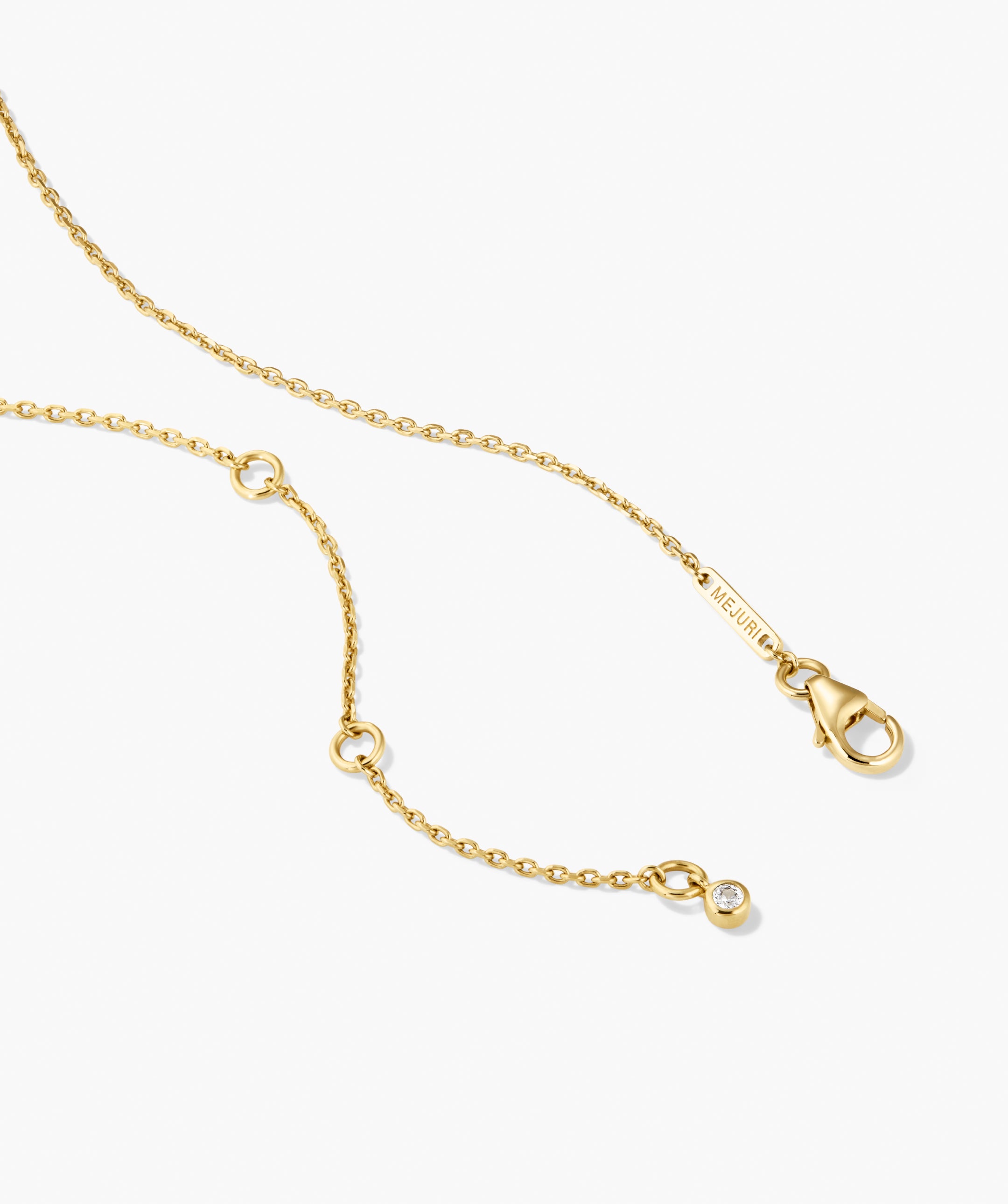 Organic DÃ´me Curve Gemstone Necklace with 14k-gold chain, adjustable length, lobster-claw clasp, and bezel-set diamond charm, stamped with MEJURI tag.