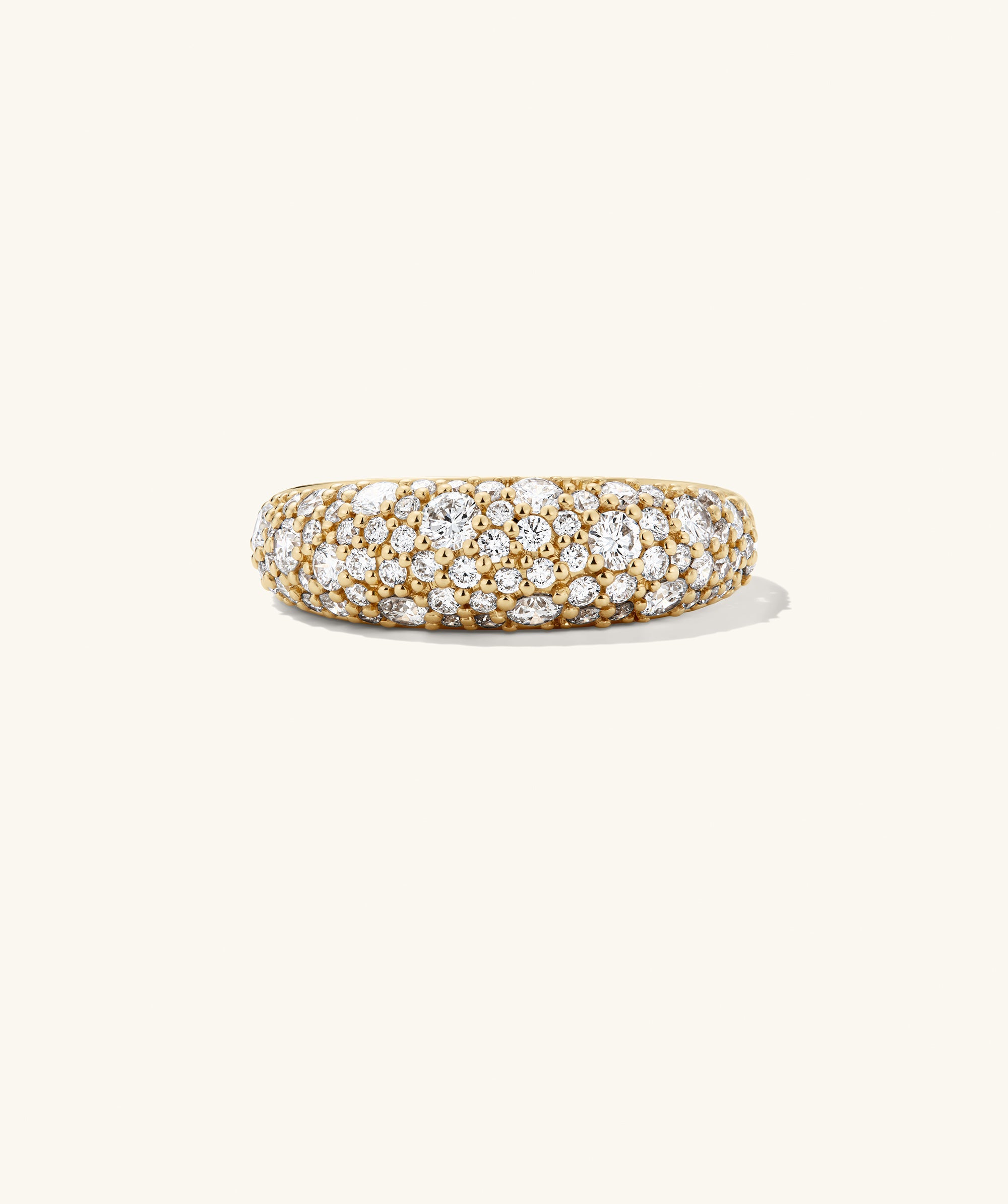 DÃ´me PavÃ© Lab Grown Diamond Ring featuring a dense cobblestone setting of varied-sized diamonds for a smooth, continuous shine, highlighting its standout design.