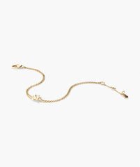 Round Lab Grown Sapphire Bracelet featuring a fine gold chain with a central solitaire white gemstone, a lobster-claw clasp, and an extension chain with a gold tag.